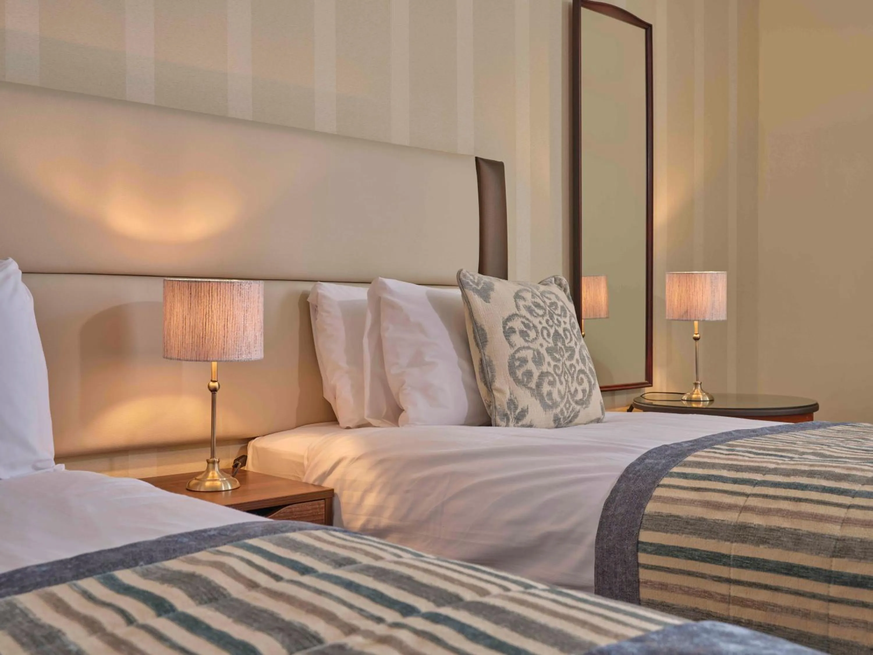 Bed in Royal Beacon Hotel