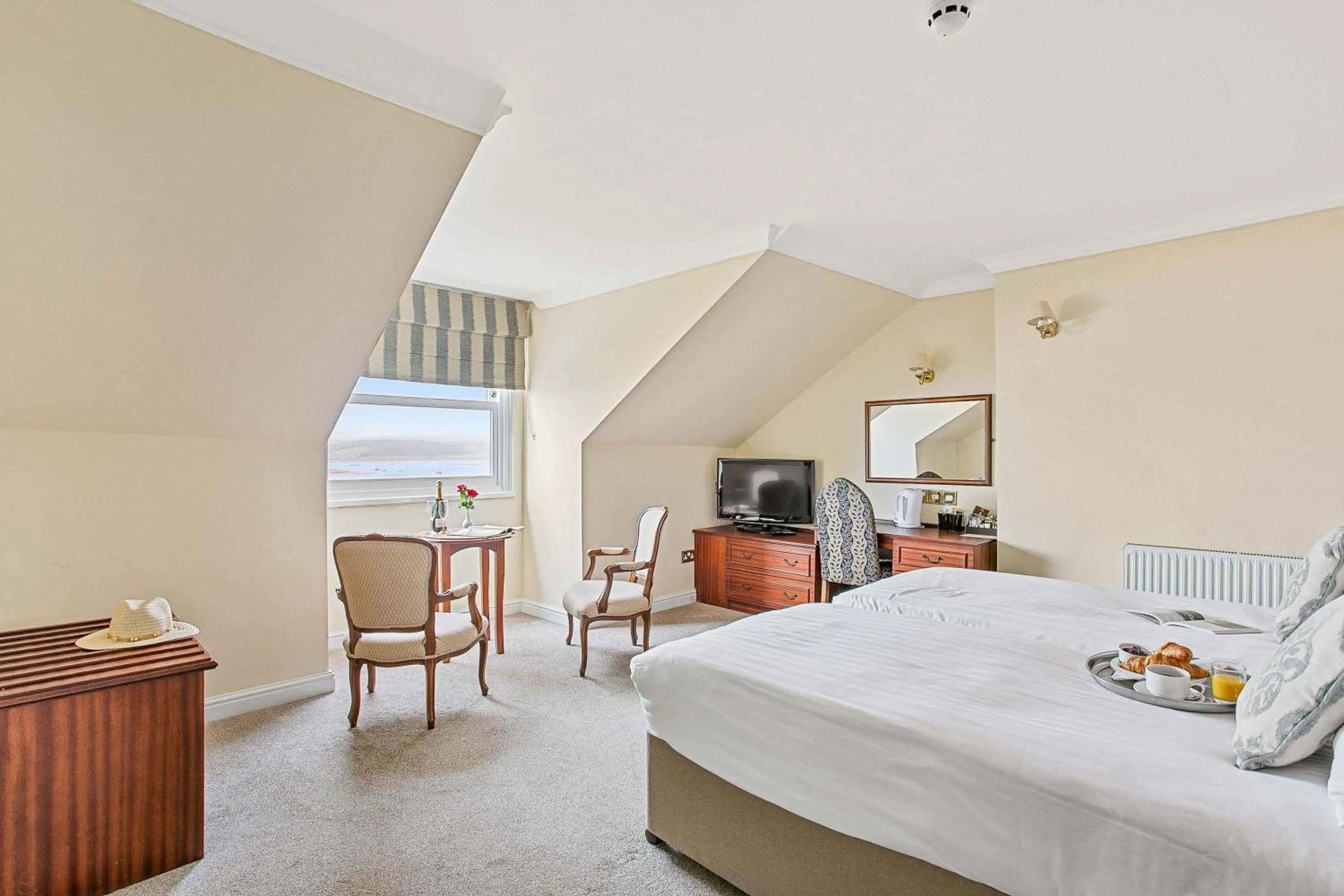 Bed in Royal Beacon Hotel