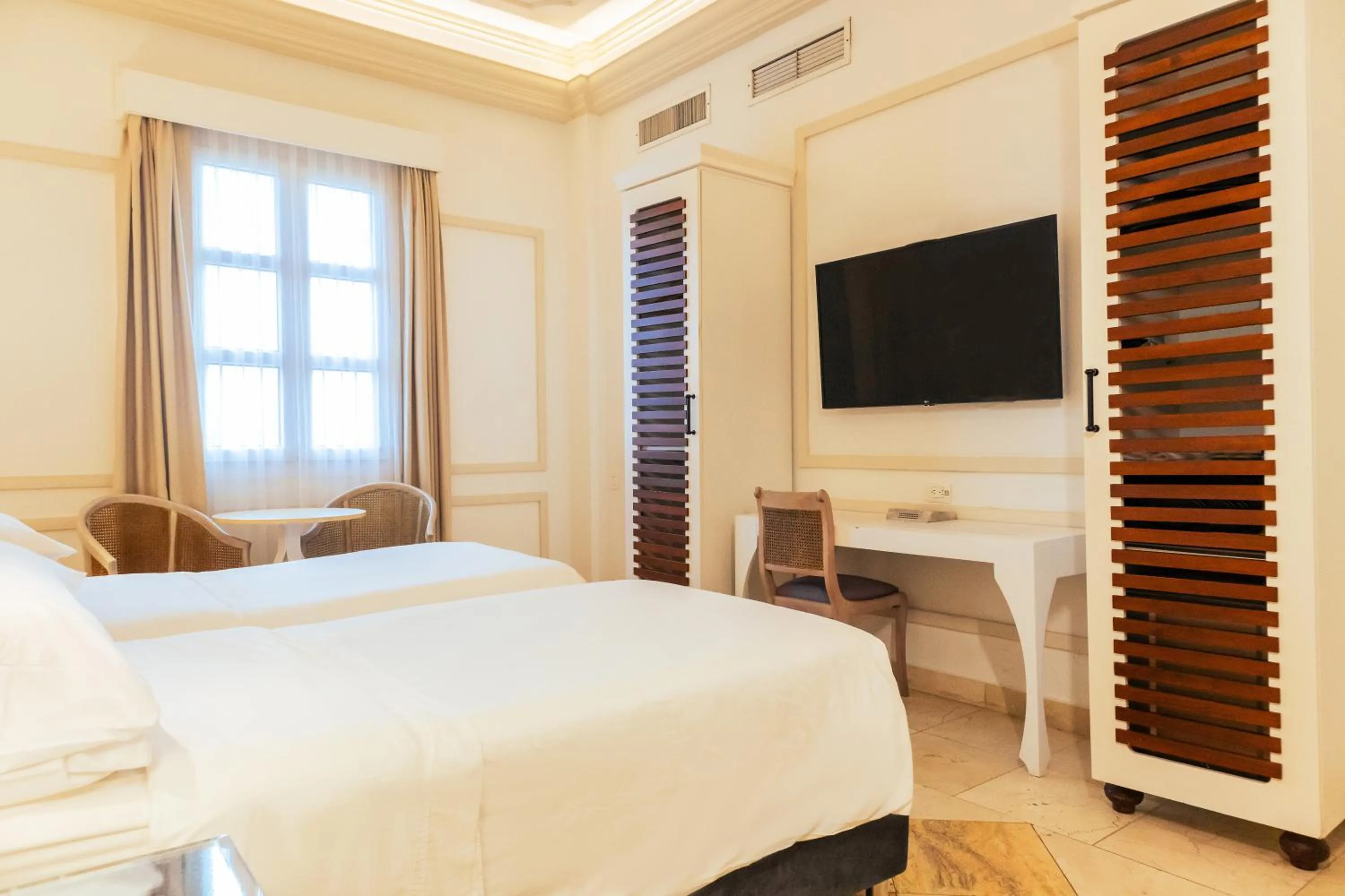 Bed in Hotel Caribe by Faranda Grand, a member of Radisson Individuals