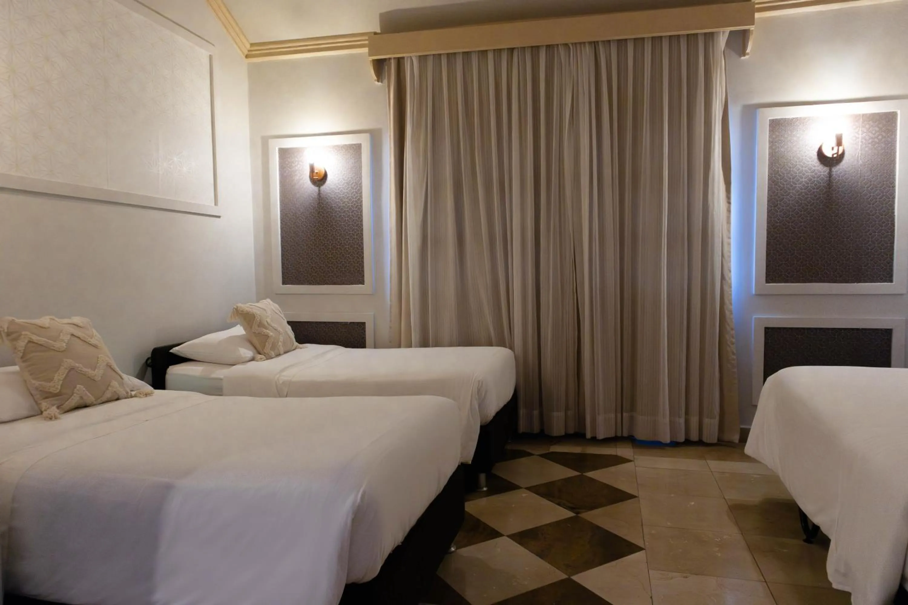 Bed in Hotel Caribe by Faranda Grand, a member of Radisson Individuals