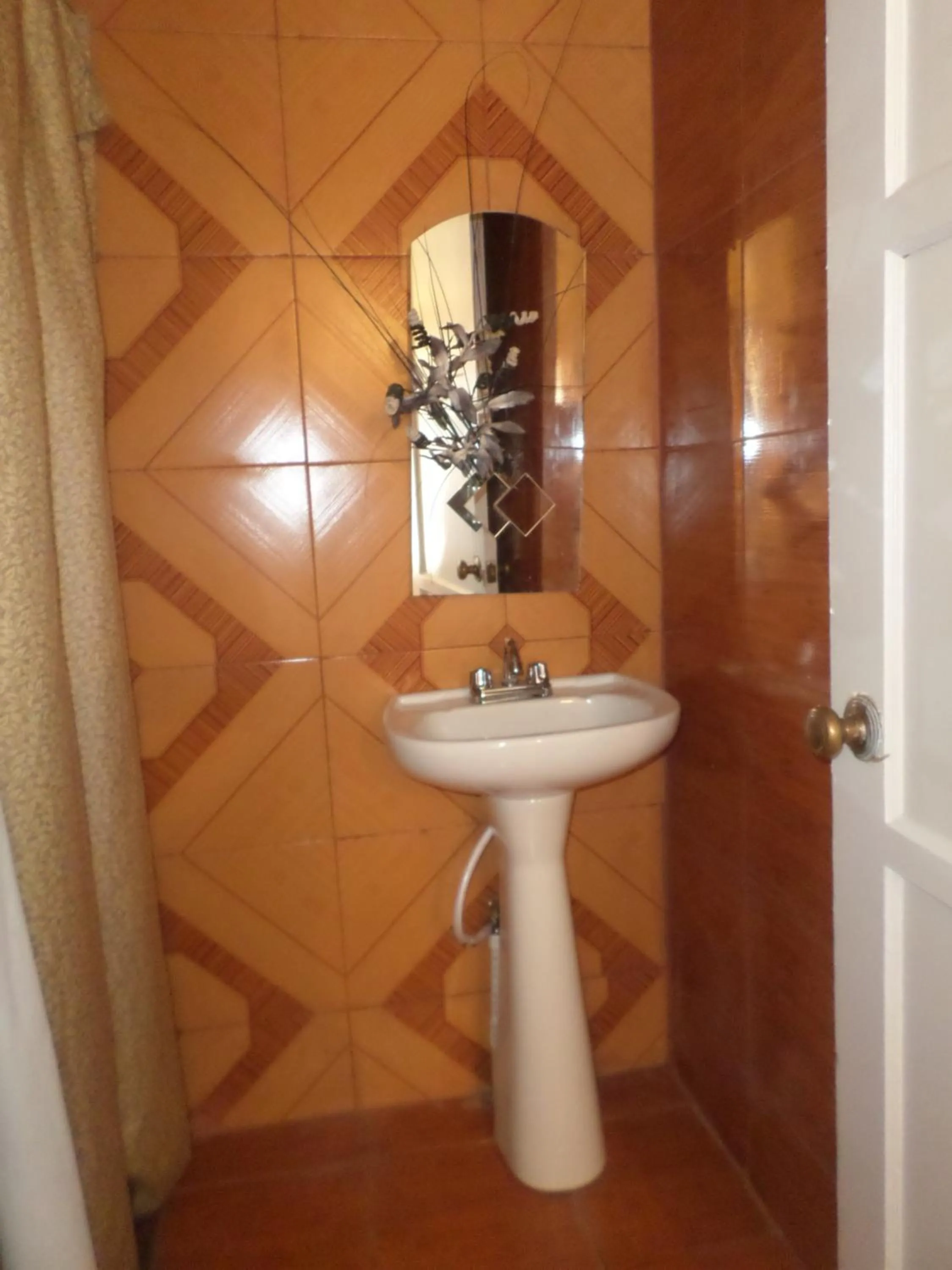 Toilet in Hospedaje Barato Mi Casita de Colores