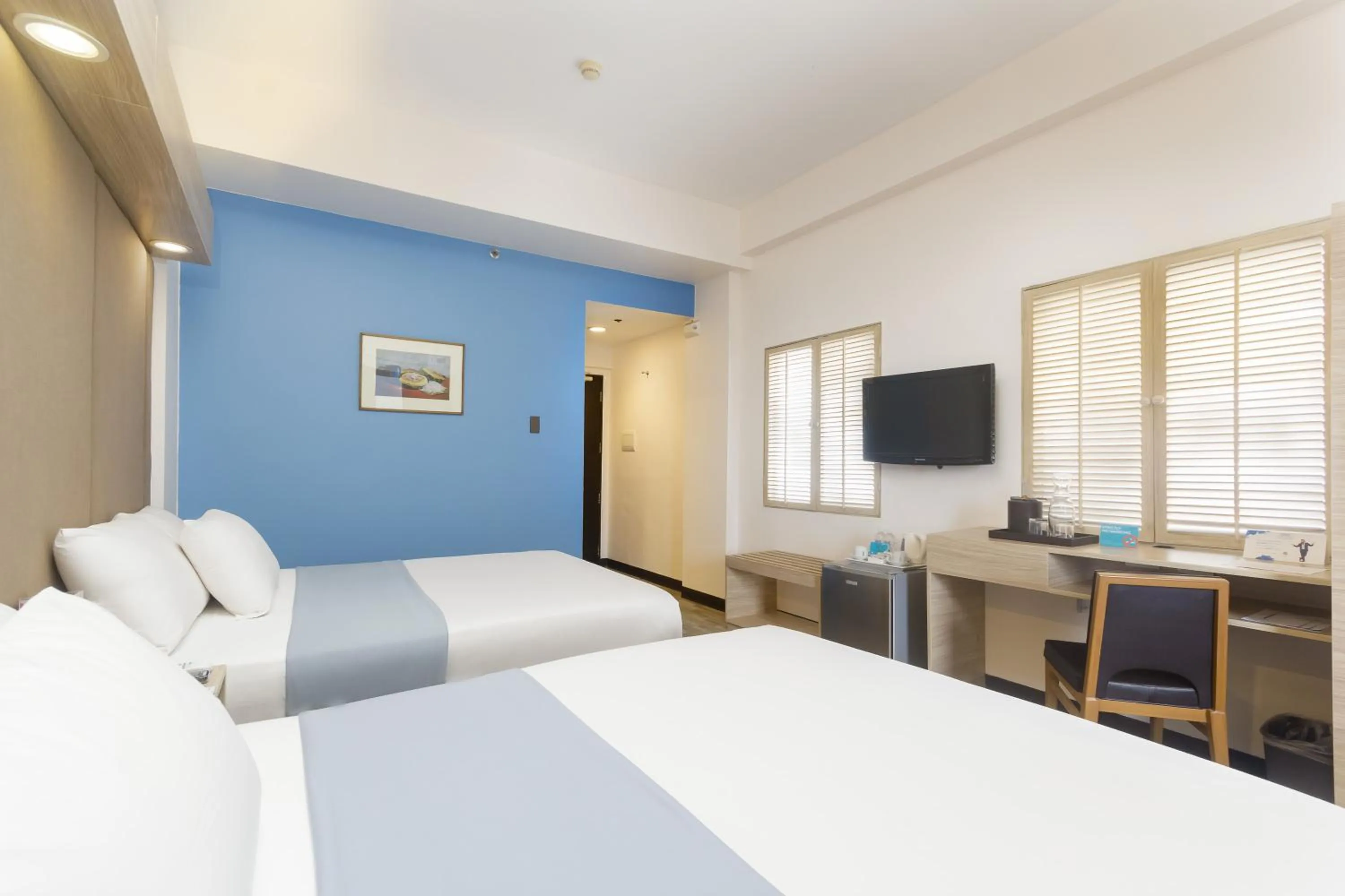 Photo of the whole room, Bed in Microtel by Wyndham Mall of Asia