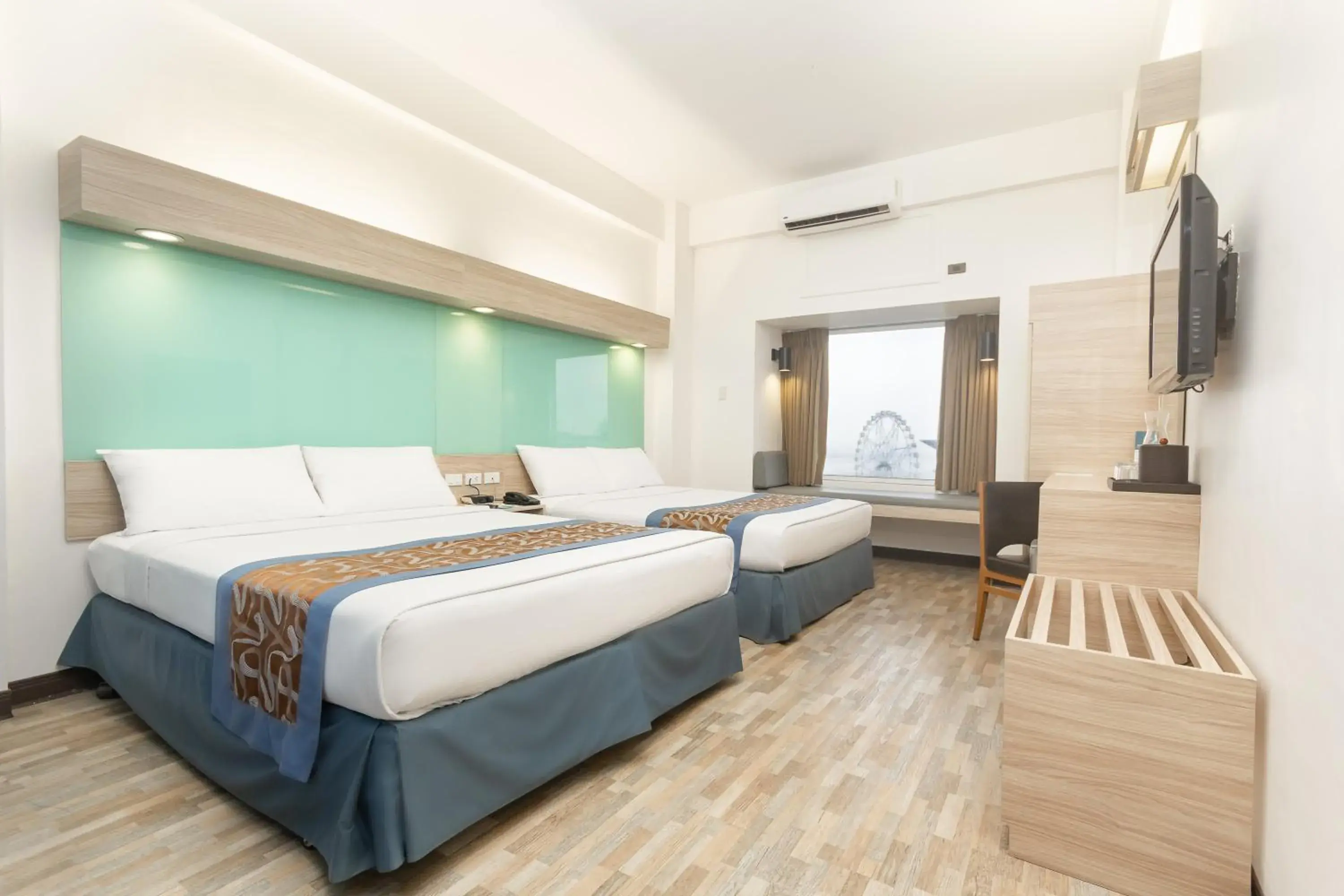 Queen Room with Two Queen Beds and City View - Non-Smoking in Microtel by Wyndham Mall of Asia Queen Room with Two Queen Beds and City View - Non-Smoking in Microtel by Wyndham Mall of Asia