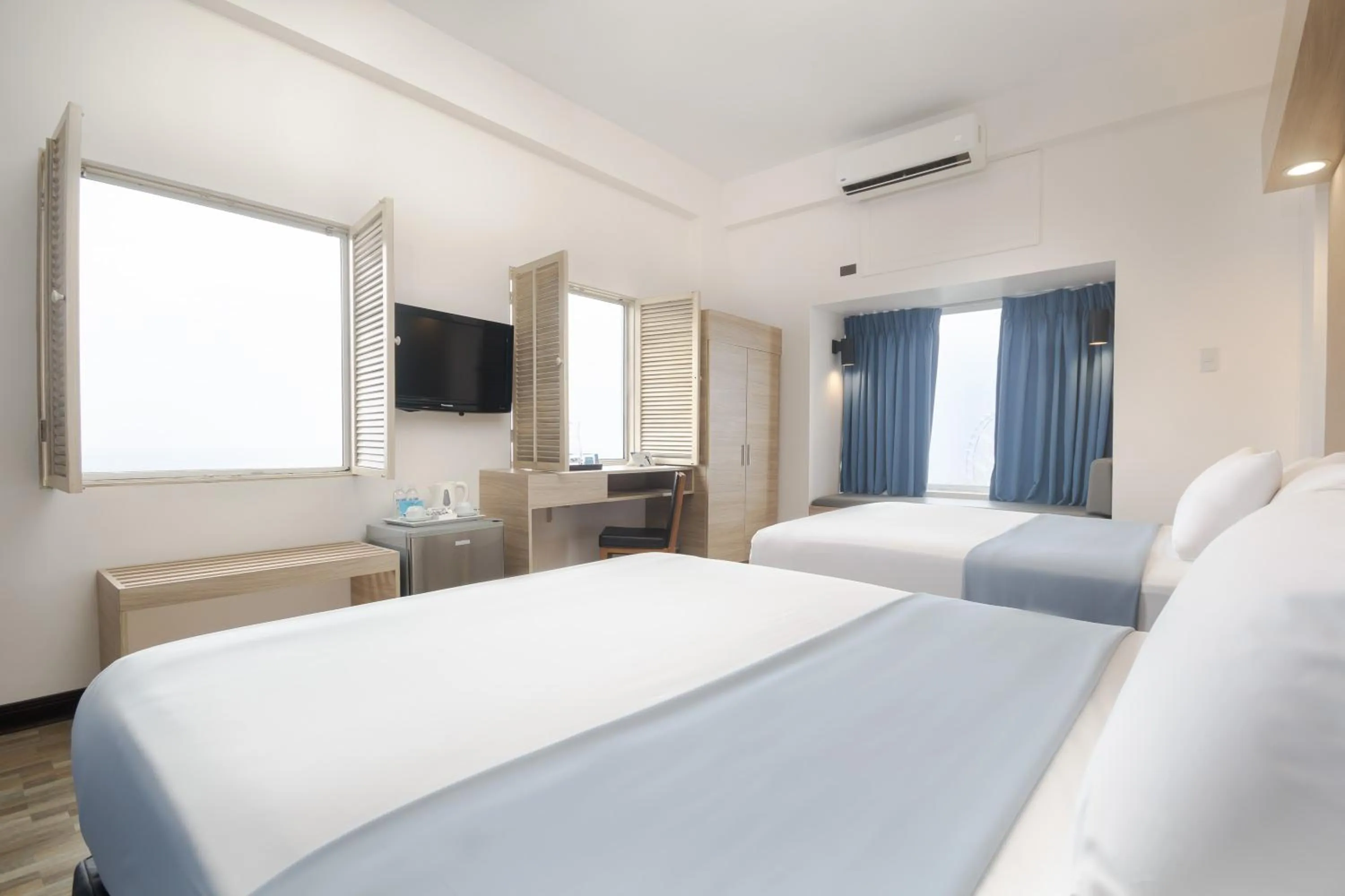 Photo of the whole room, Bed in Microtel by Wyndham Mall of Asia