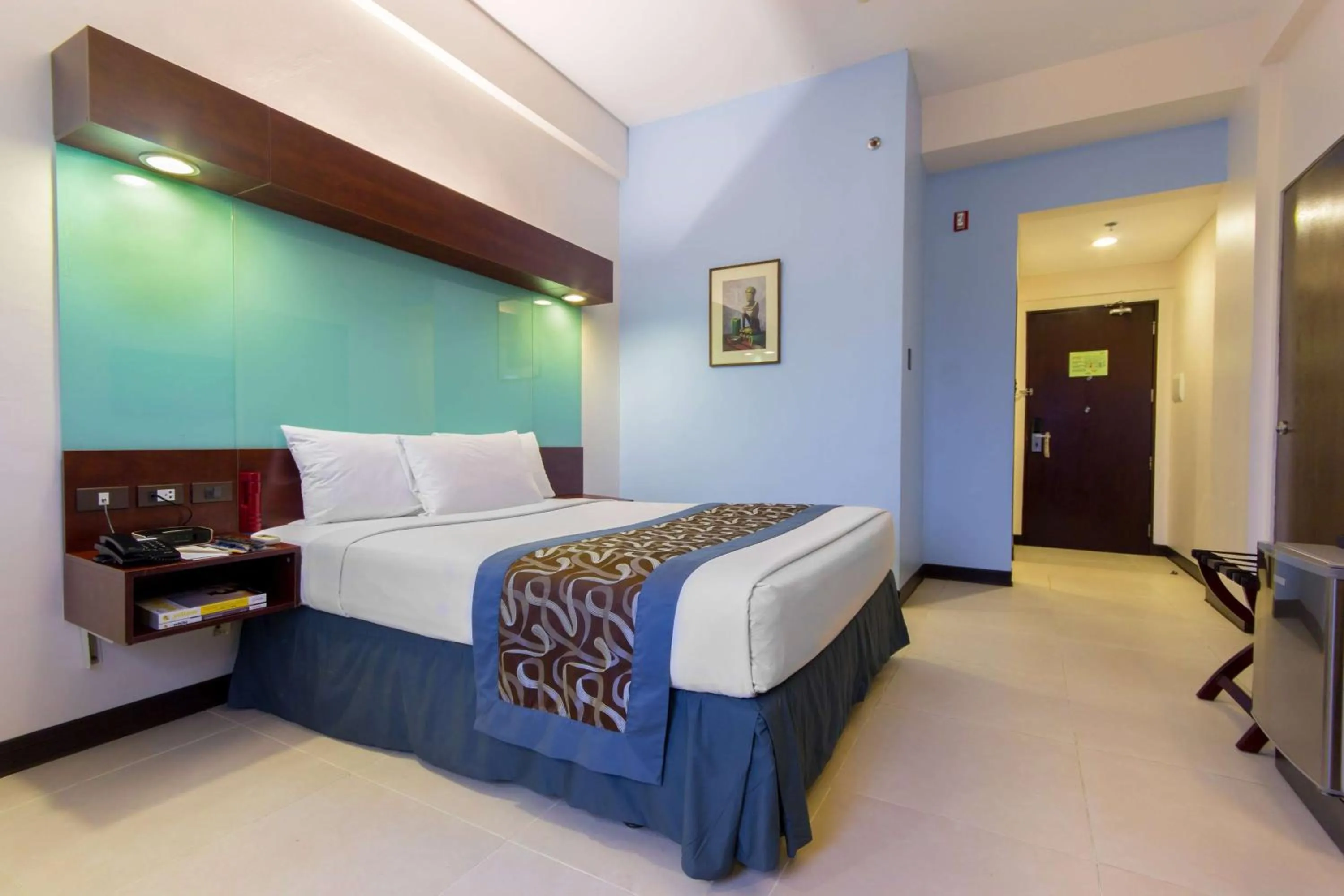 Photo of the whole room, Bed in Microtel by Wyndham Mall of Asia