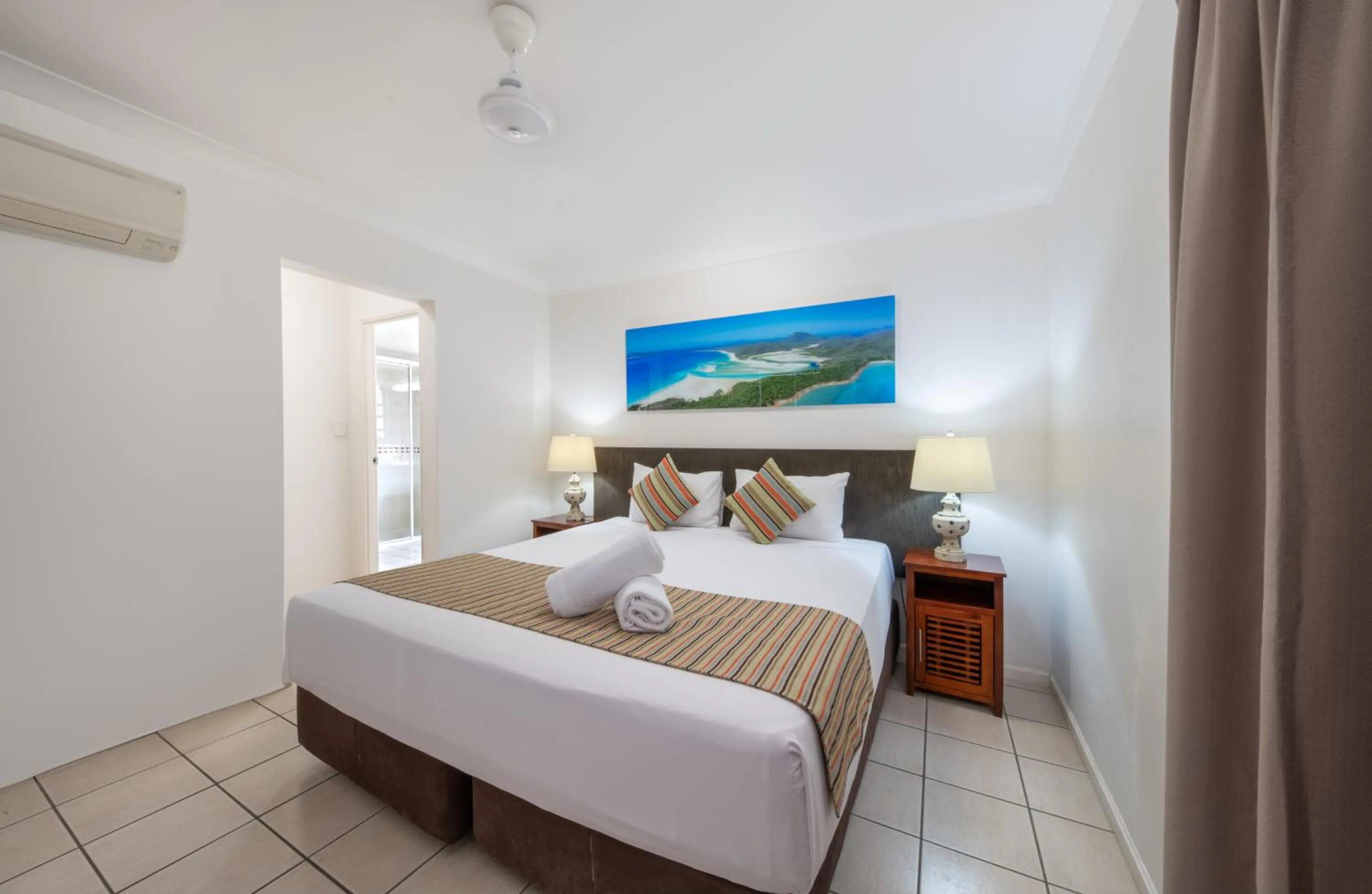 Bed in Martinique Whitsunday Resort