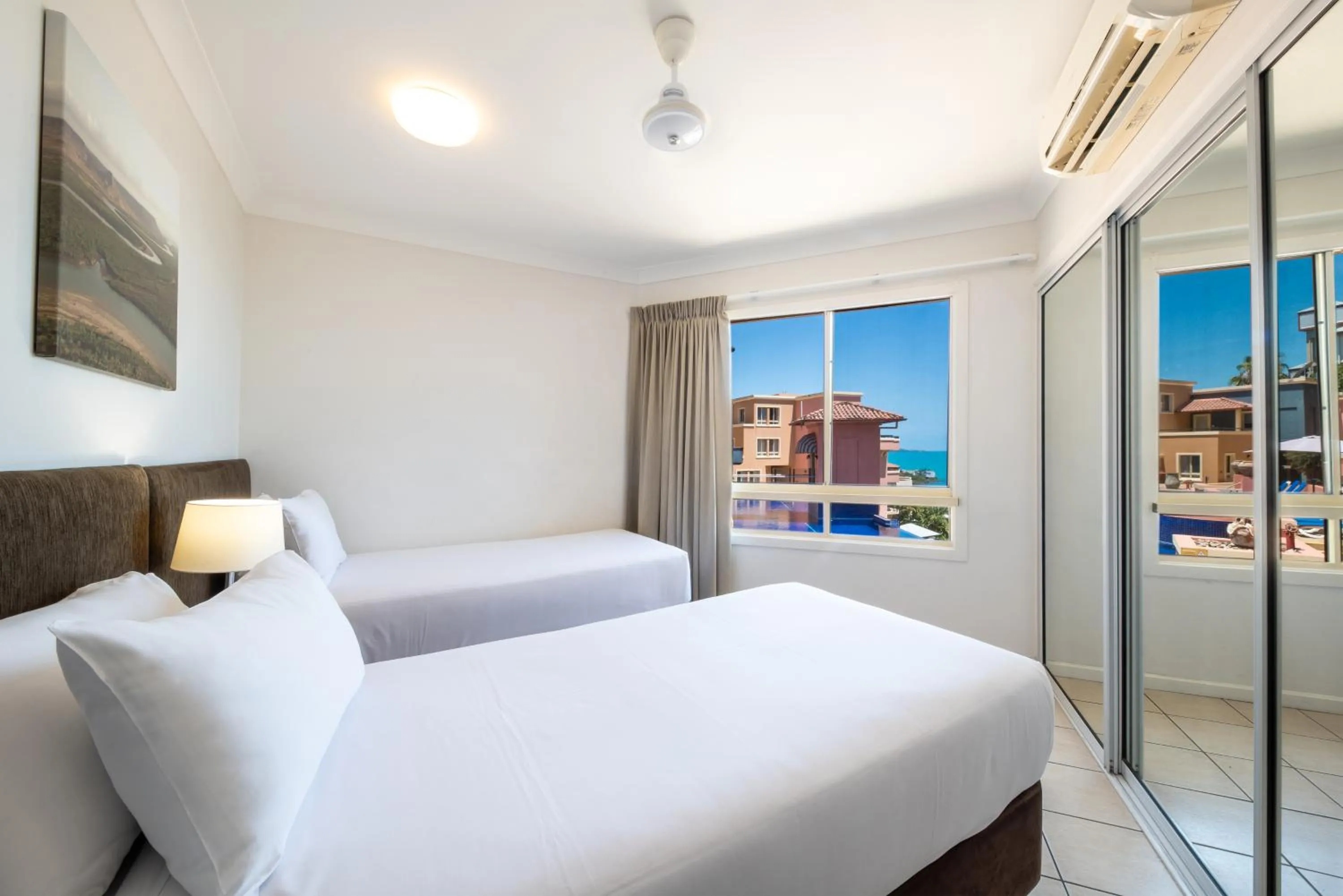 Bed in Martinique Whitsunday Resort