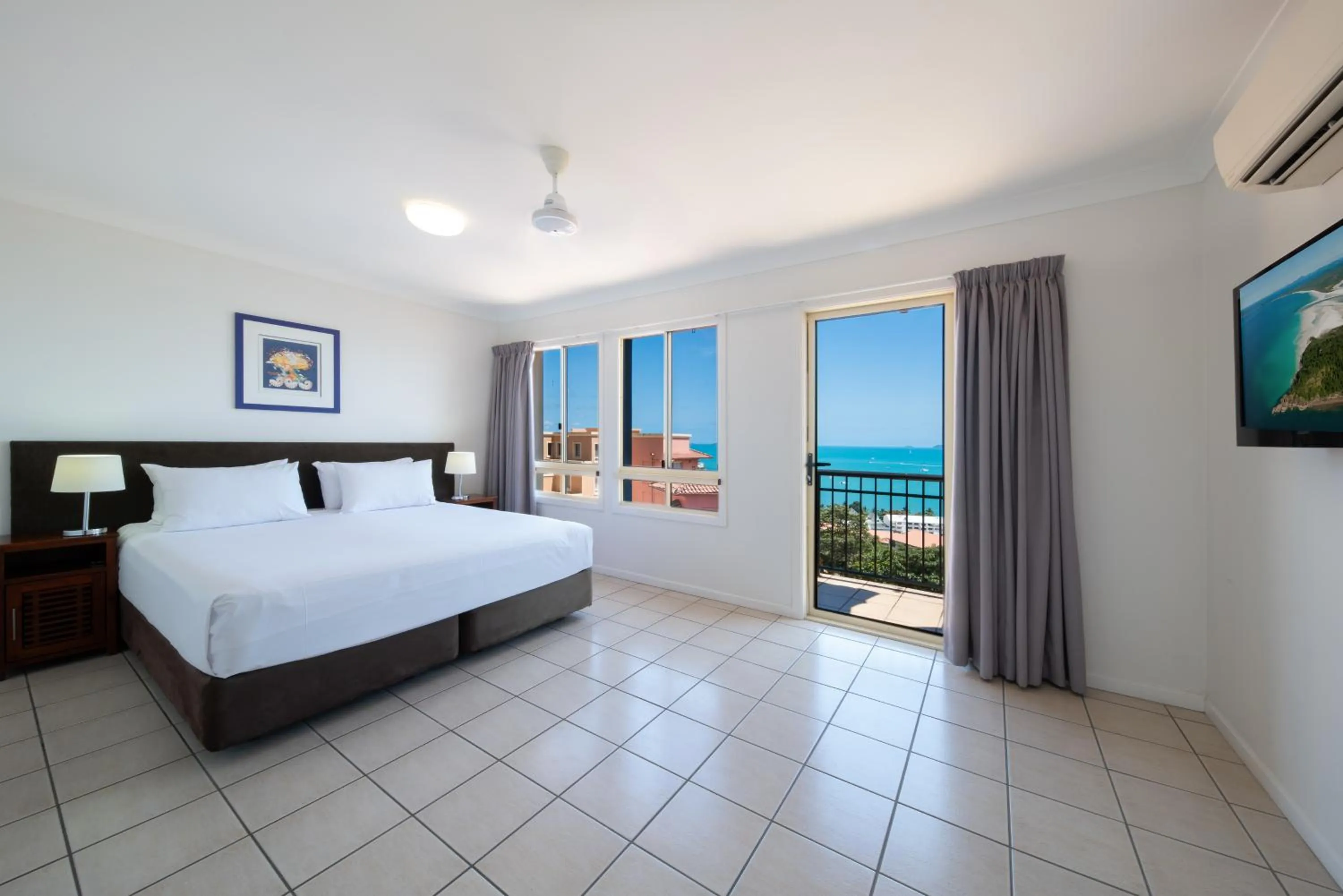 Bed in Martinique Whitsunday Resort