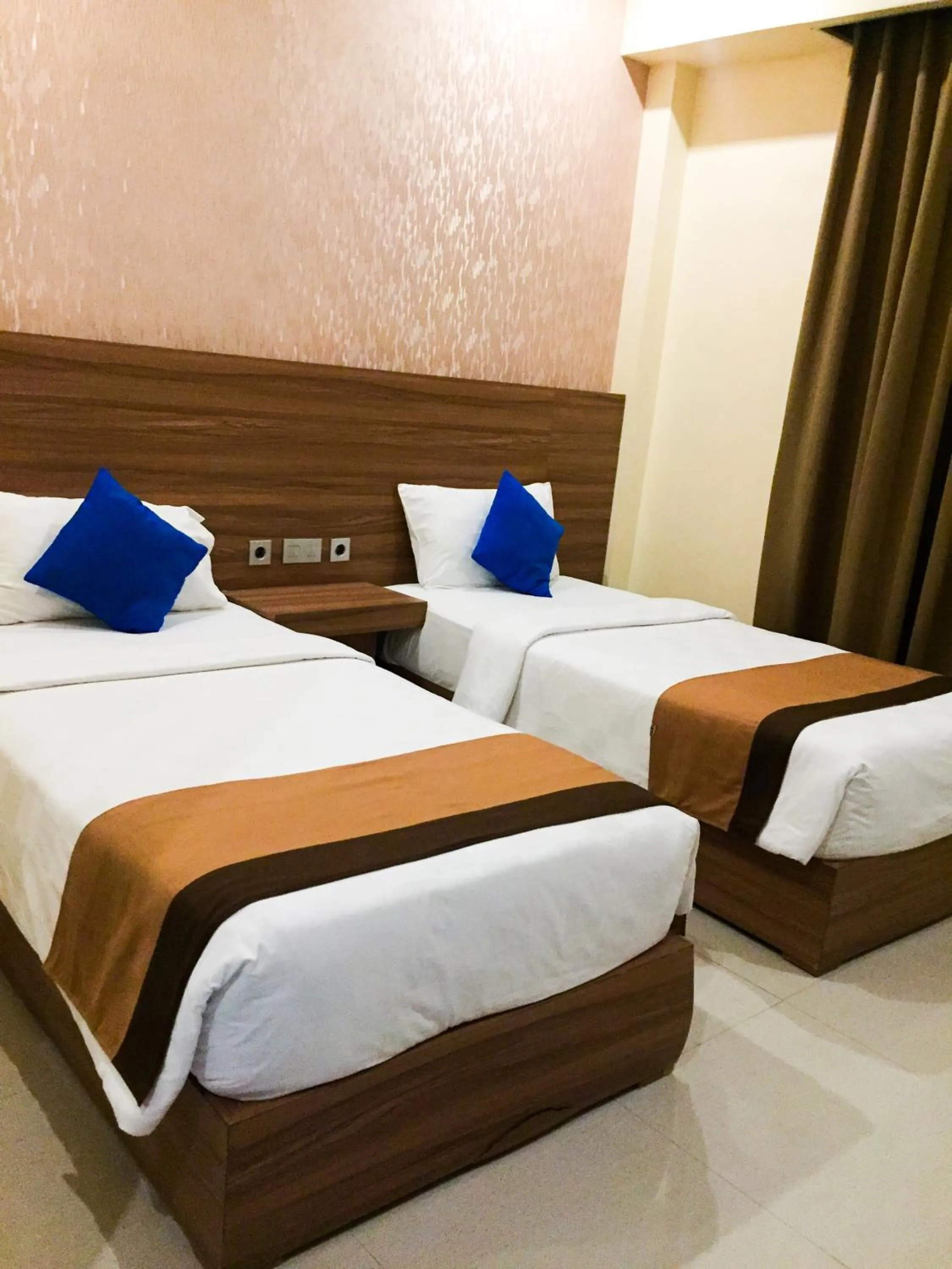 Bed in Padadita Beach Hotel