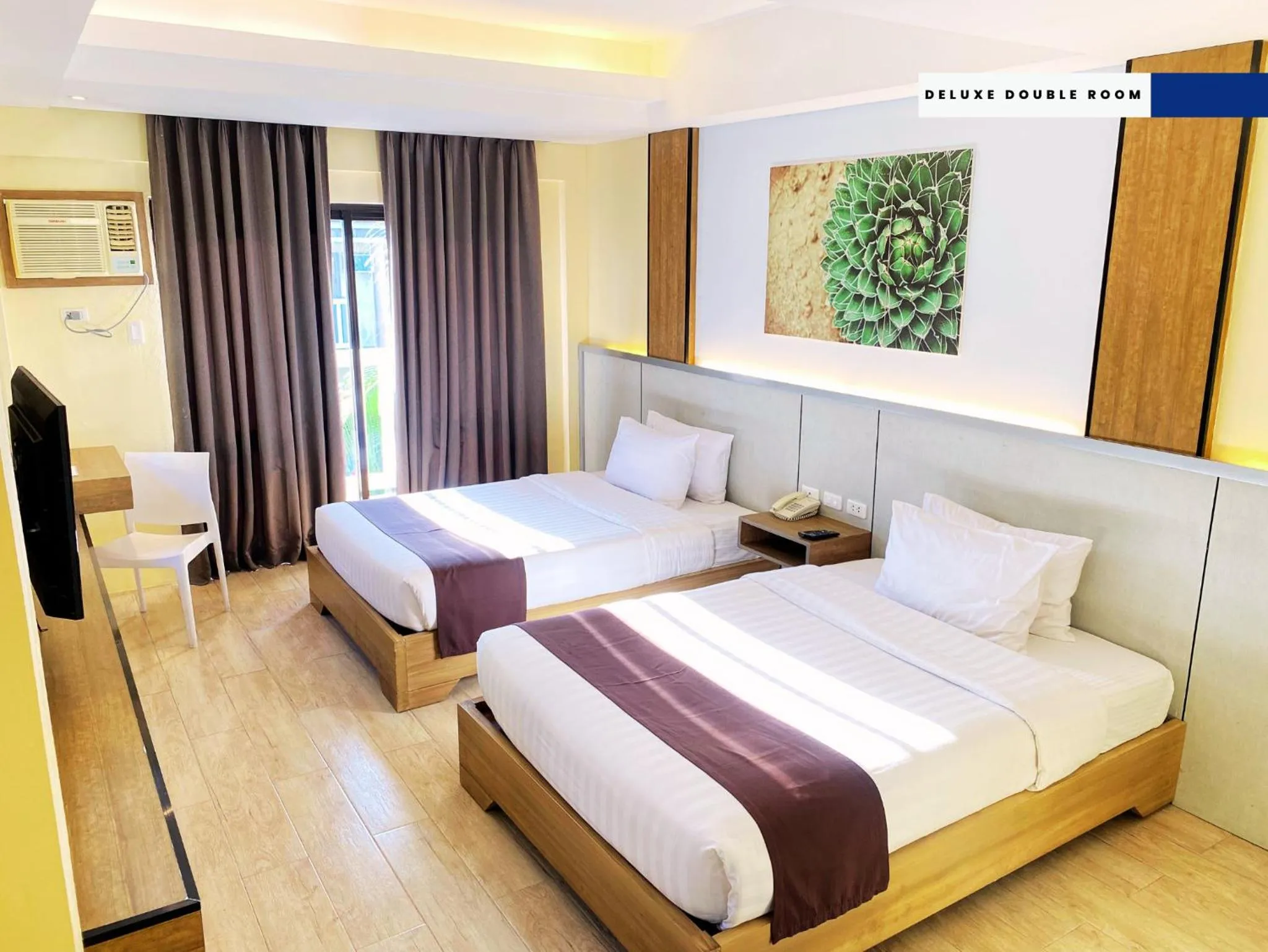 Bed in Aquamira Hotel & Resort