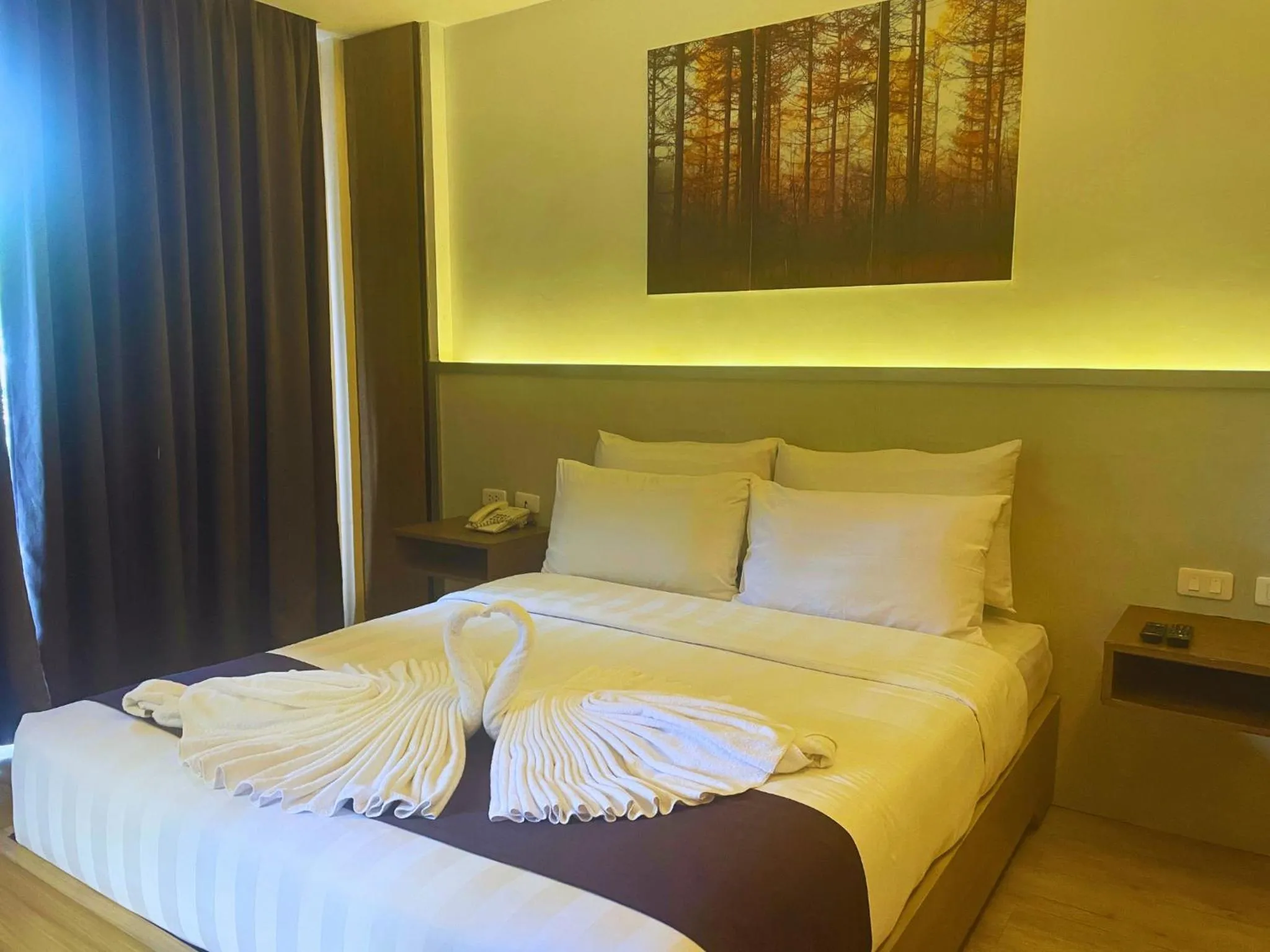 Bed in Aquamira Hotel & Resort