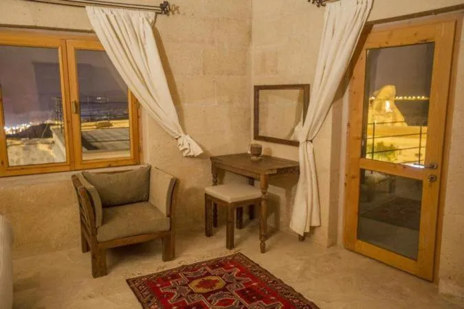 Seating area in Helike Cave Suites