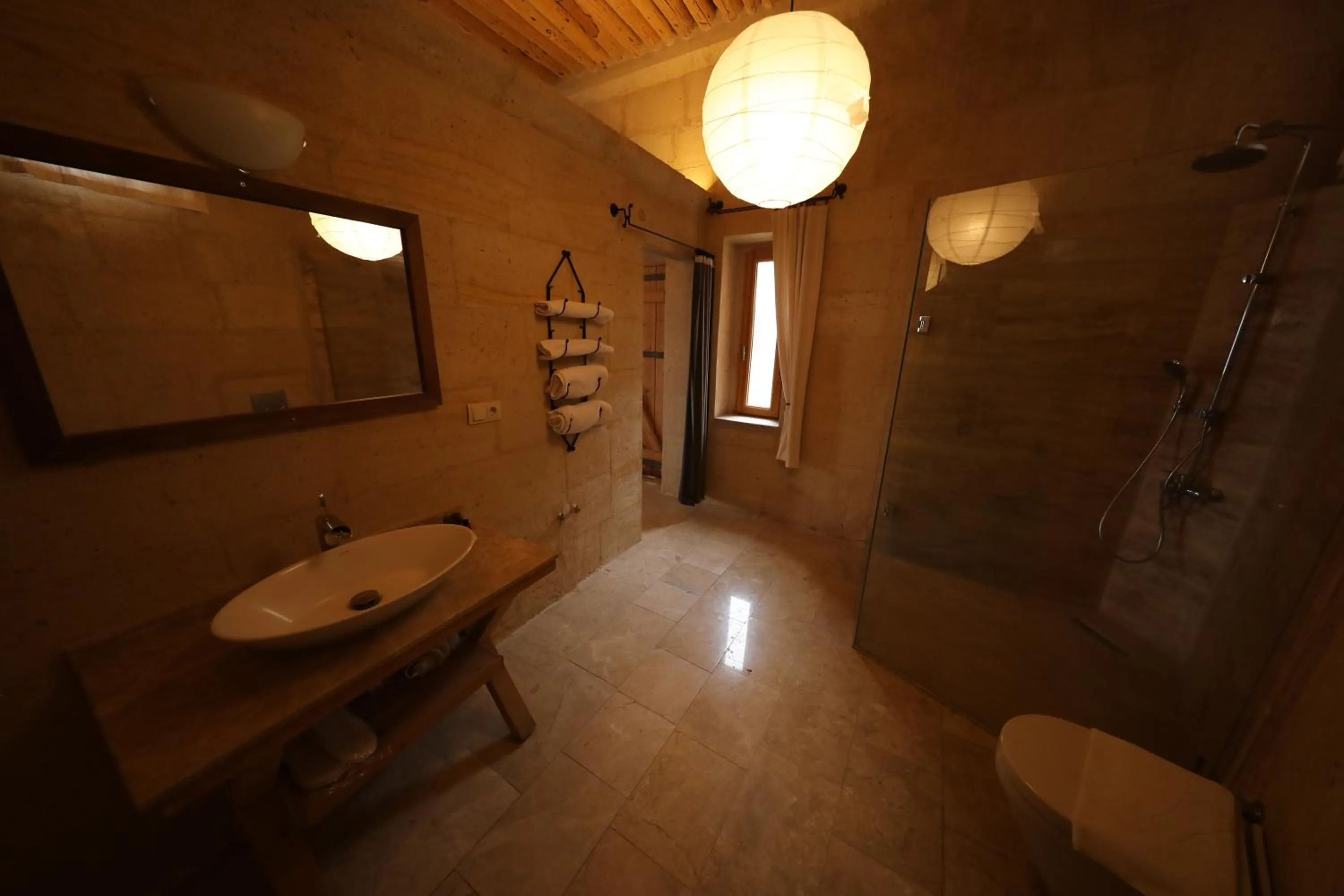 Bathroom in Helike Cave Suites