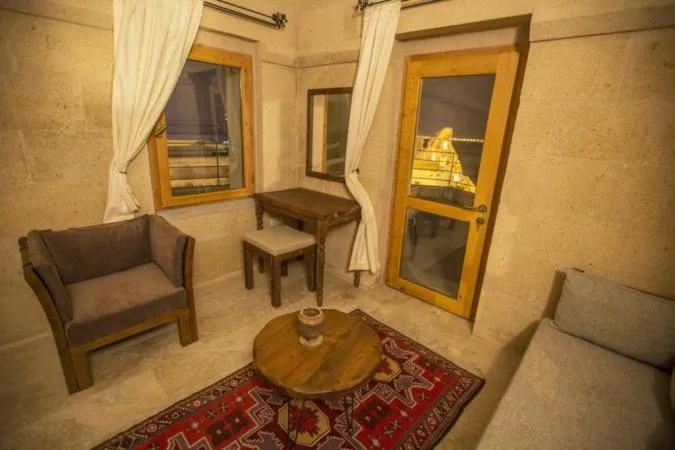 Seating area in Helike Cave Suites