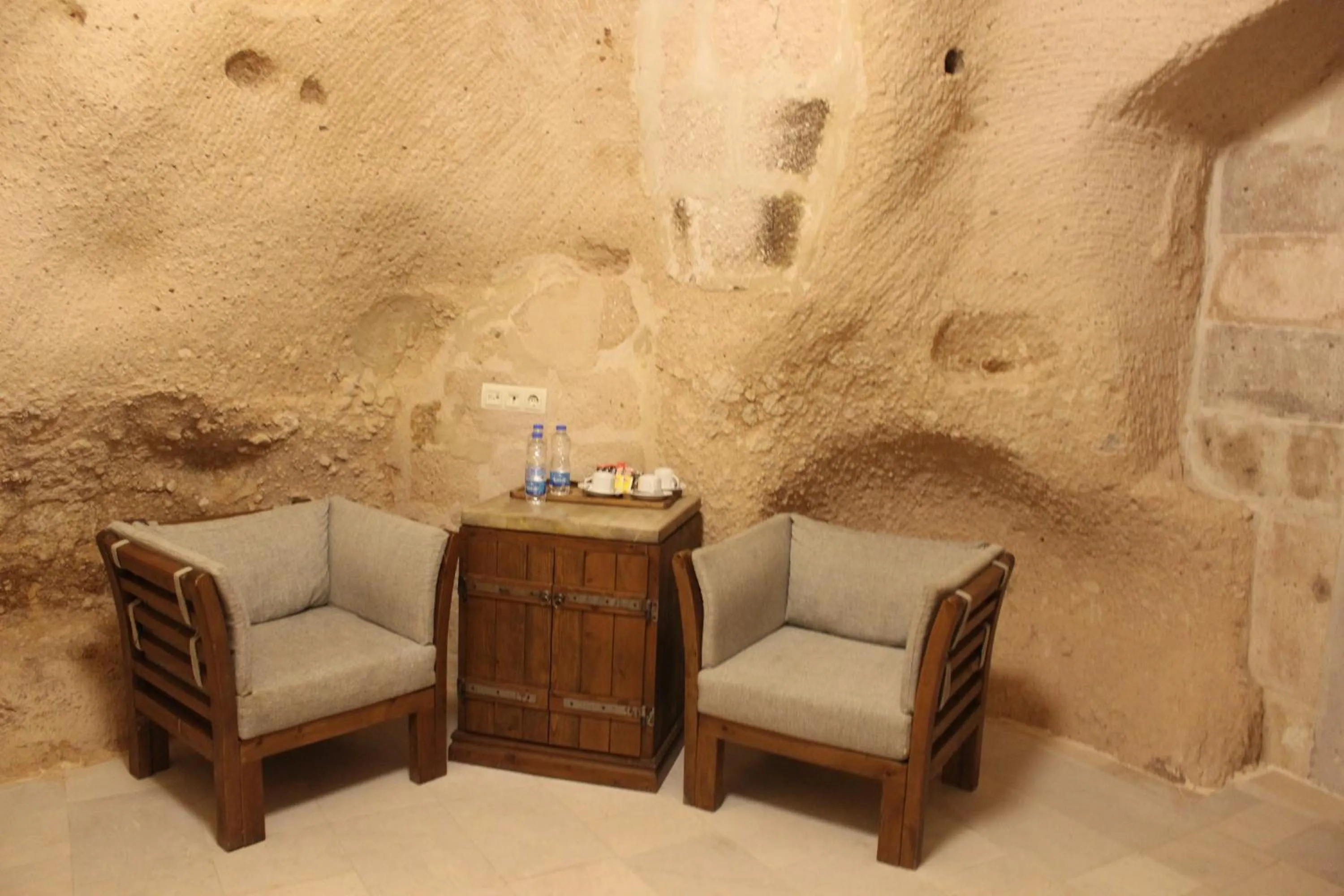 Living room in Helike Cave Suites