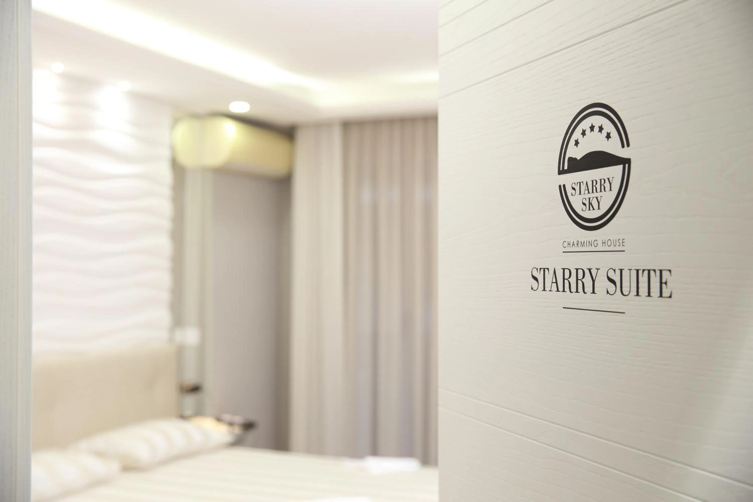 Property logo or sign, Bed in Starry Sky Charming House