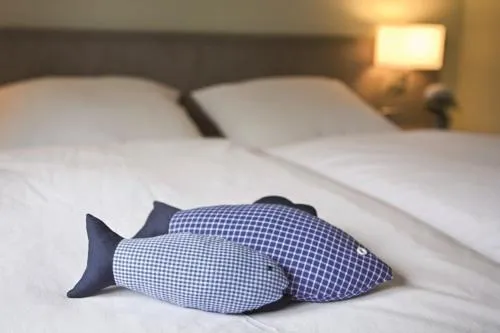 Bed in Hotel Landhaus Leuchtfeuer Nordseeinsel Pellworm