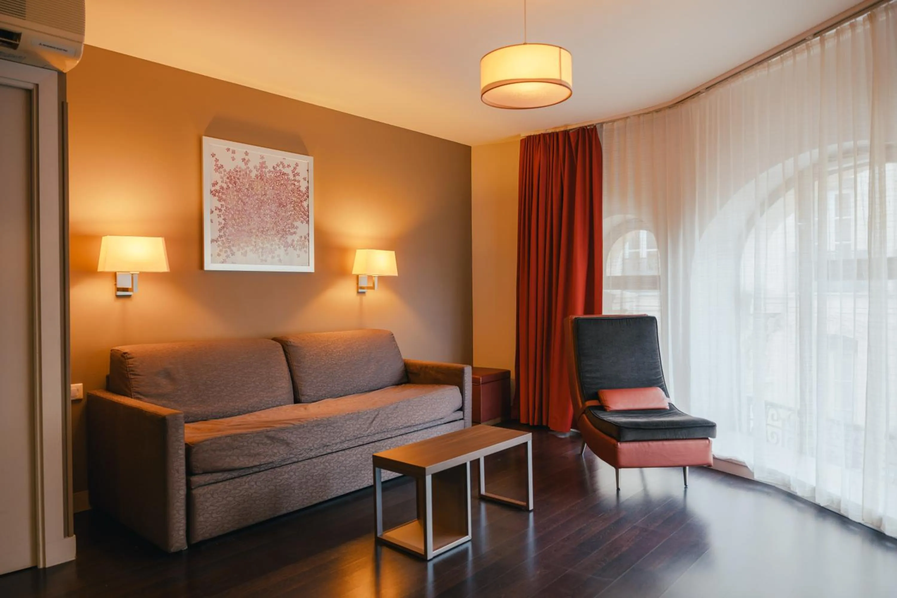 Living room in Comfort Aparthotel Saint-Etienne