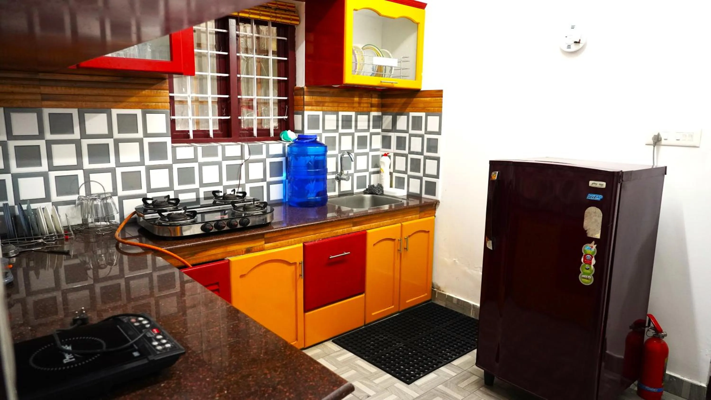 Kitchen or kitchenette in Arabian Nights Munnar Pool Villa