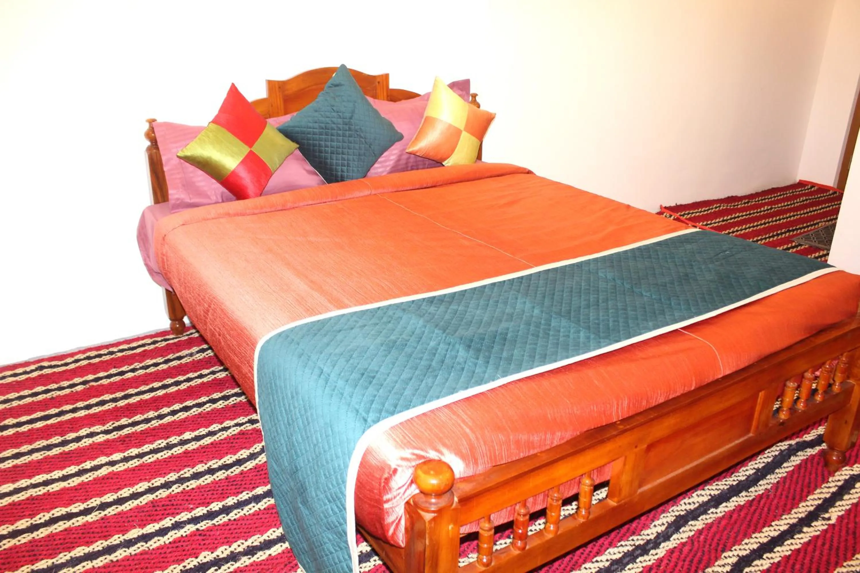 Bed in Arabian Nights Munnar Pool Villa