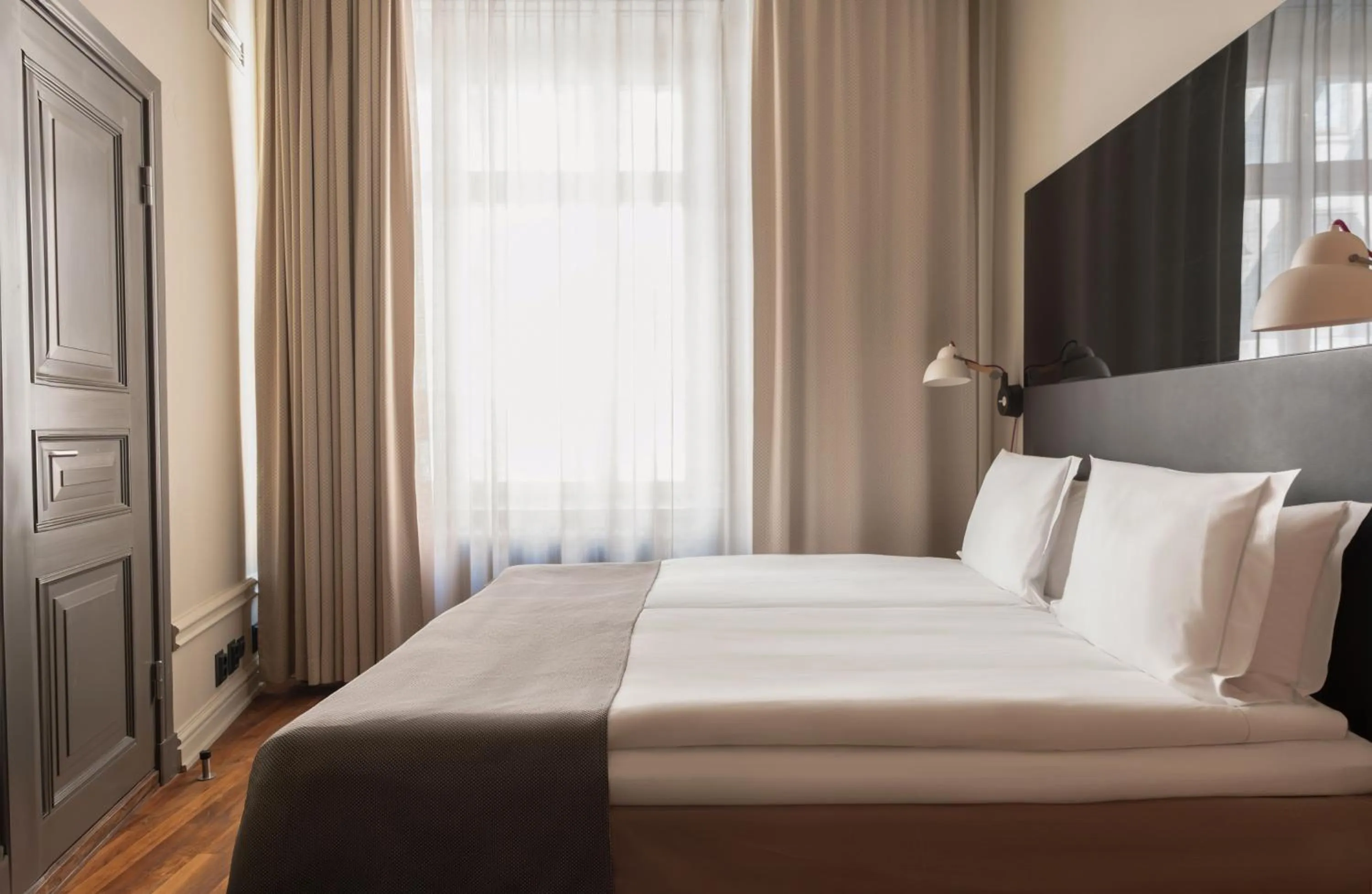 Bed in Nobis Hotel Stockholm, a Member of Design Hotels