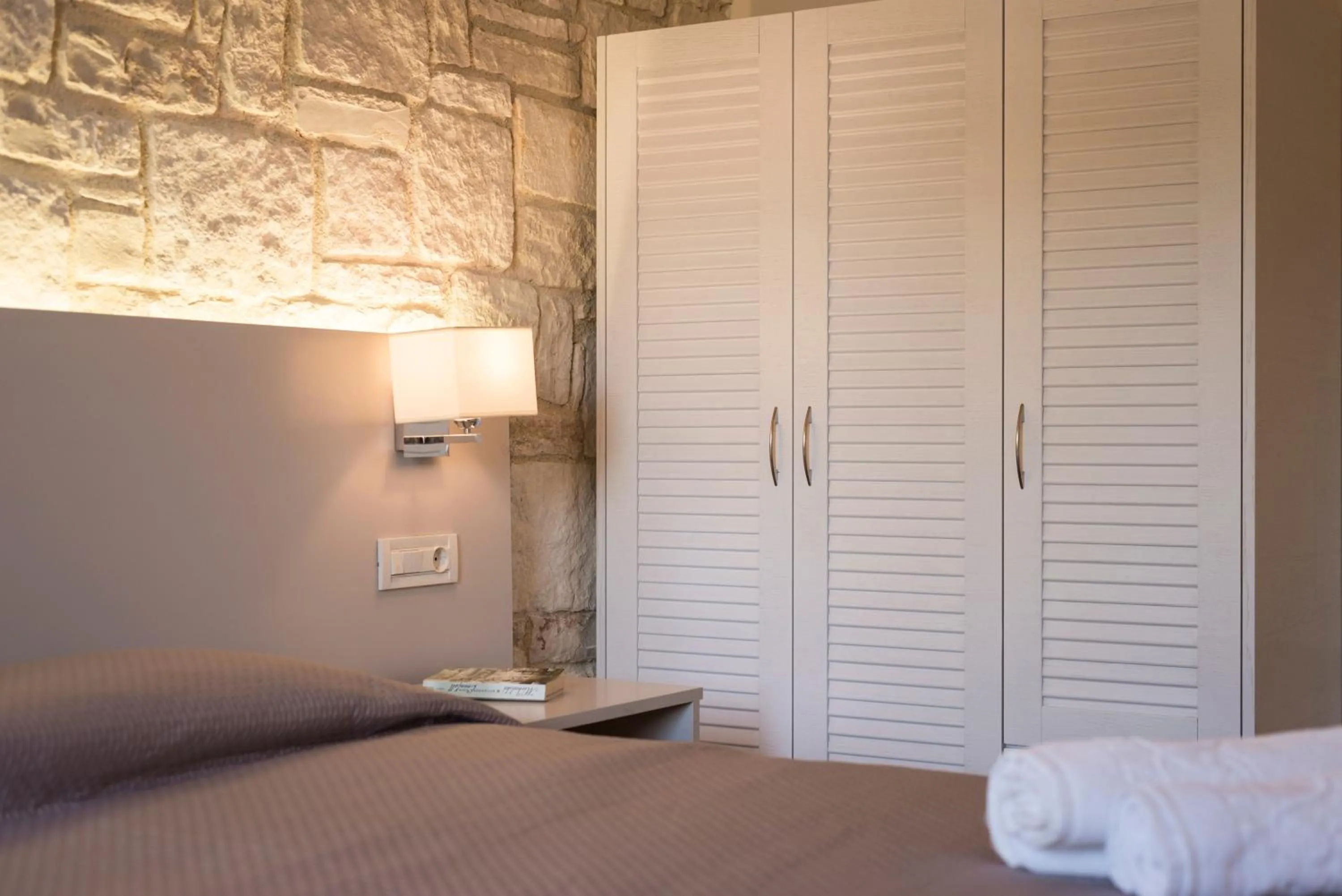 Bed in Spilia Village Hotel & Villas