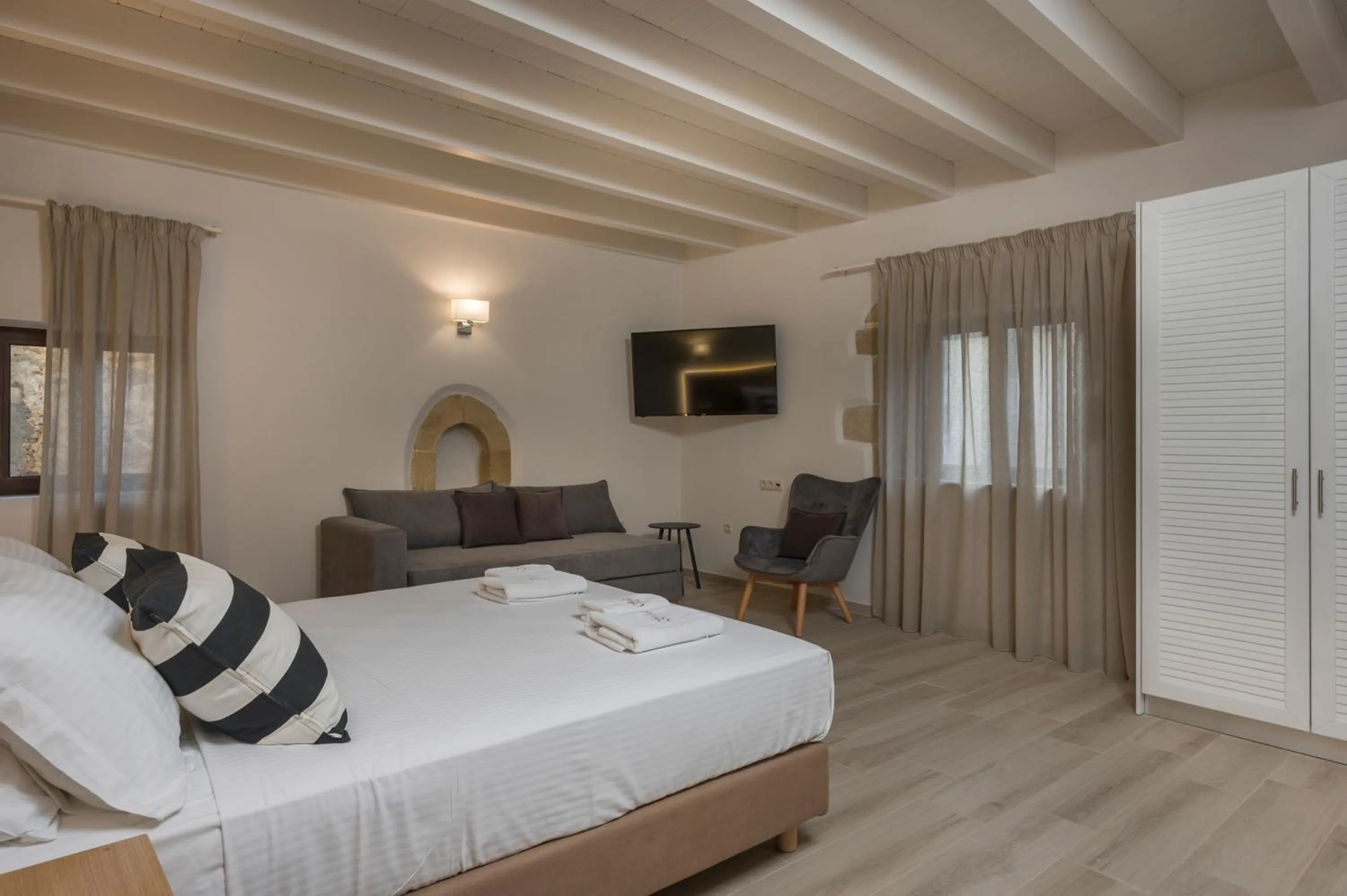 Bed in Spilia Village Hotel & Villas