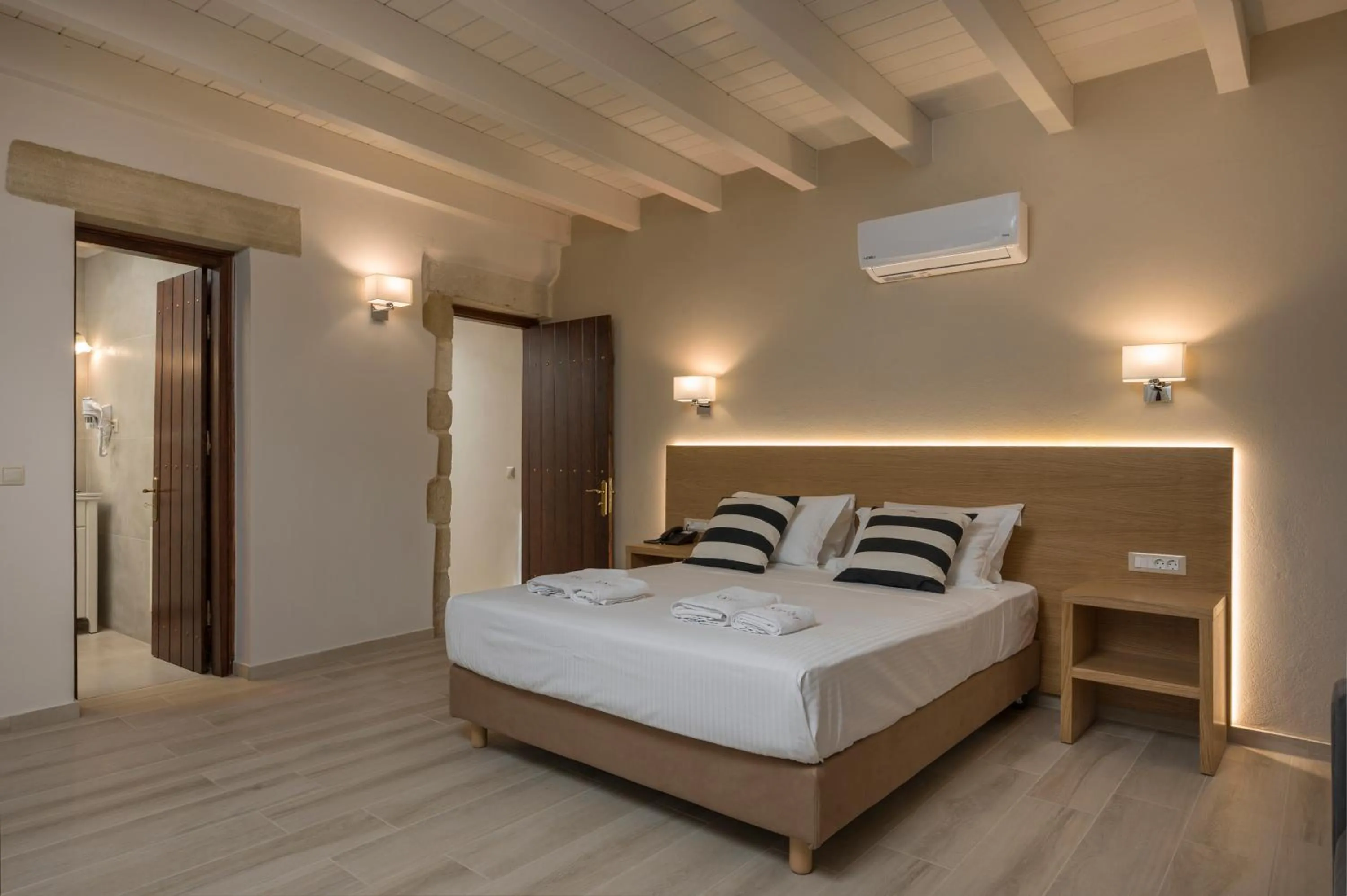 Bed in Spilia Village Hotel & Villas