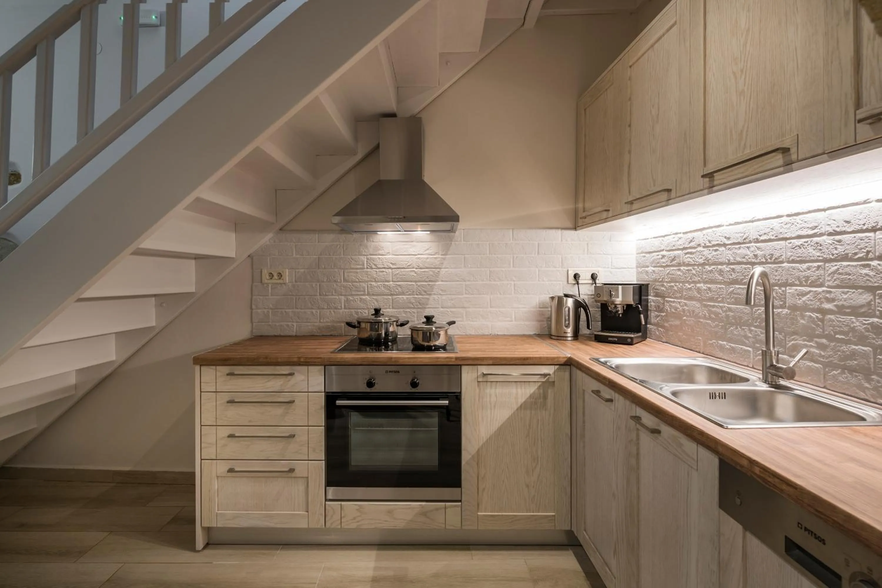 Kitchen or kitchenette in Spilia Village Hotel & Villas