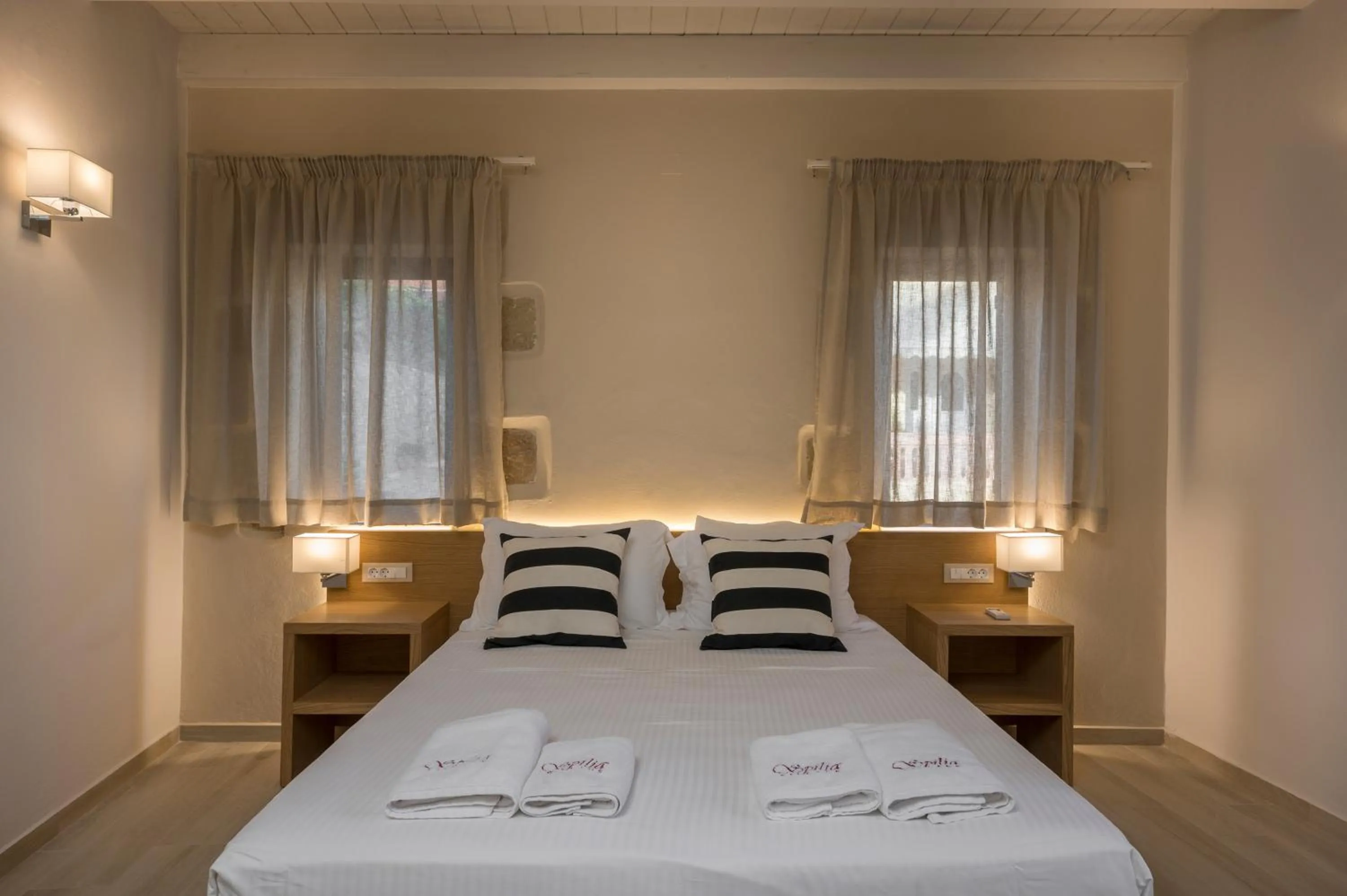 Bed in Spilia Village Hotel & Villas