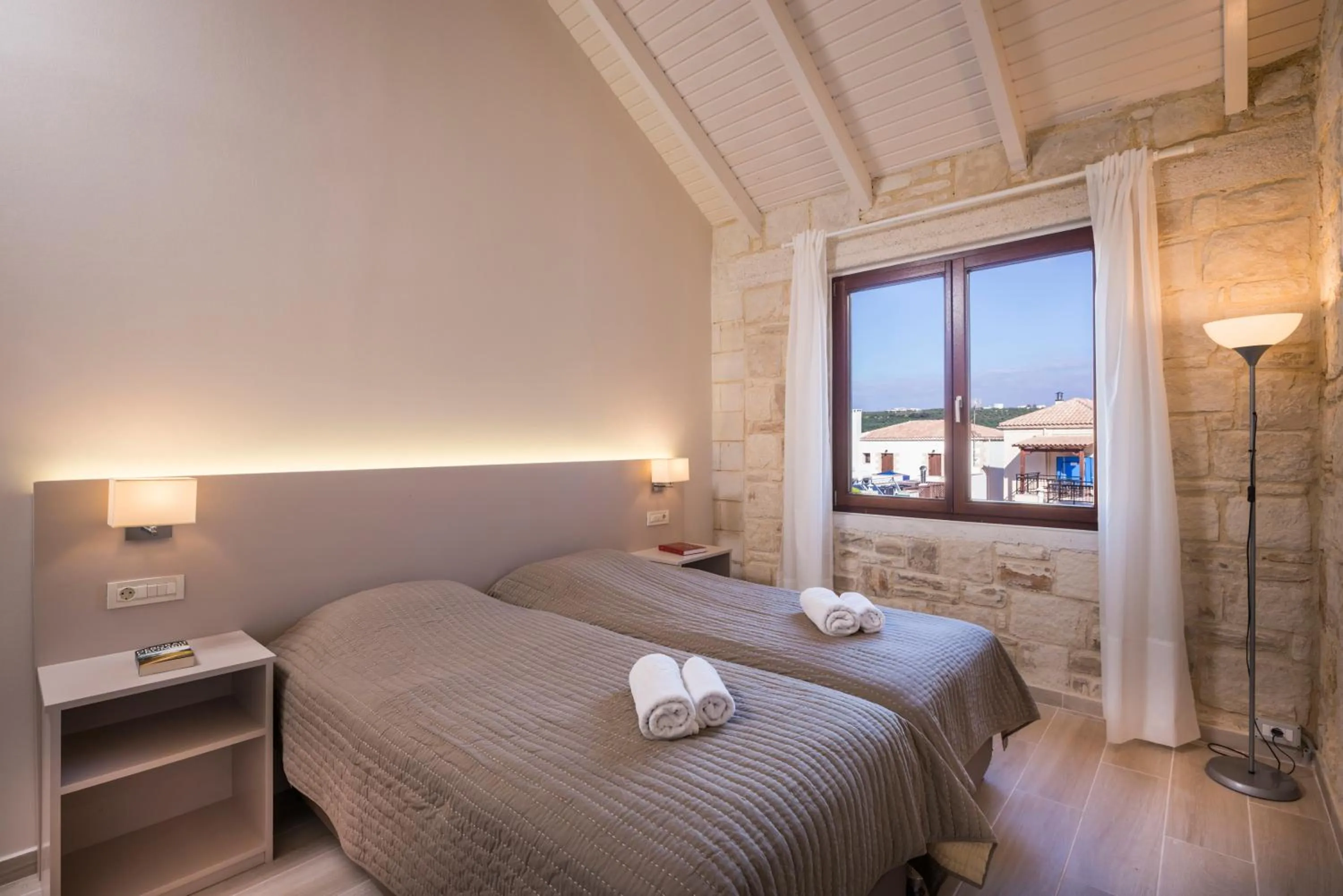 Bed in Spilia Village Hotel & Villas
