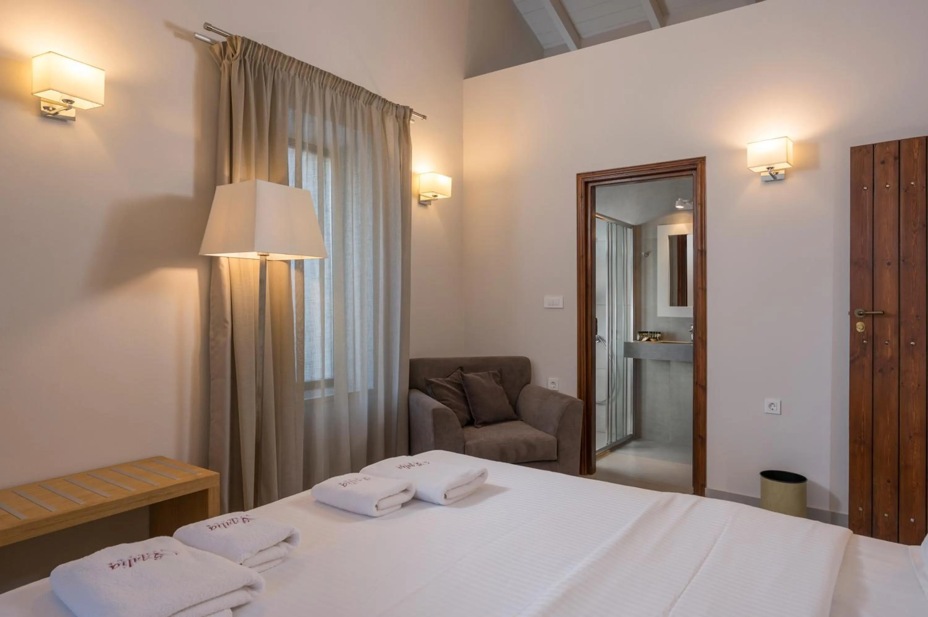 Bed in Spilia Village Hotel & Villas