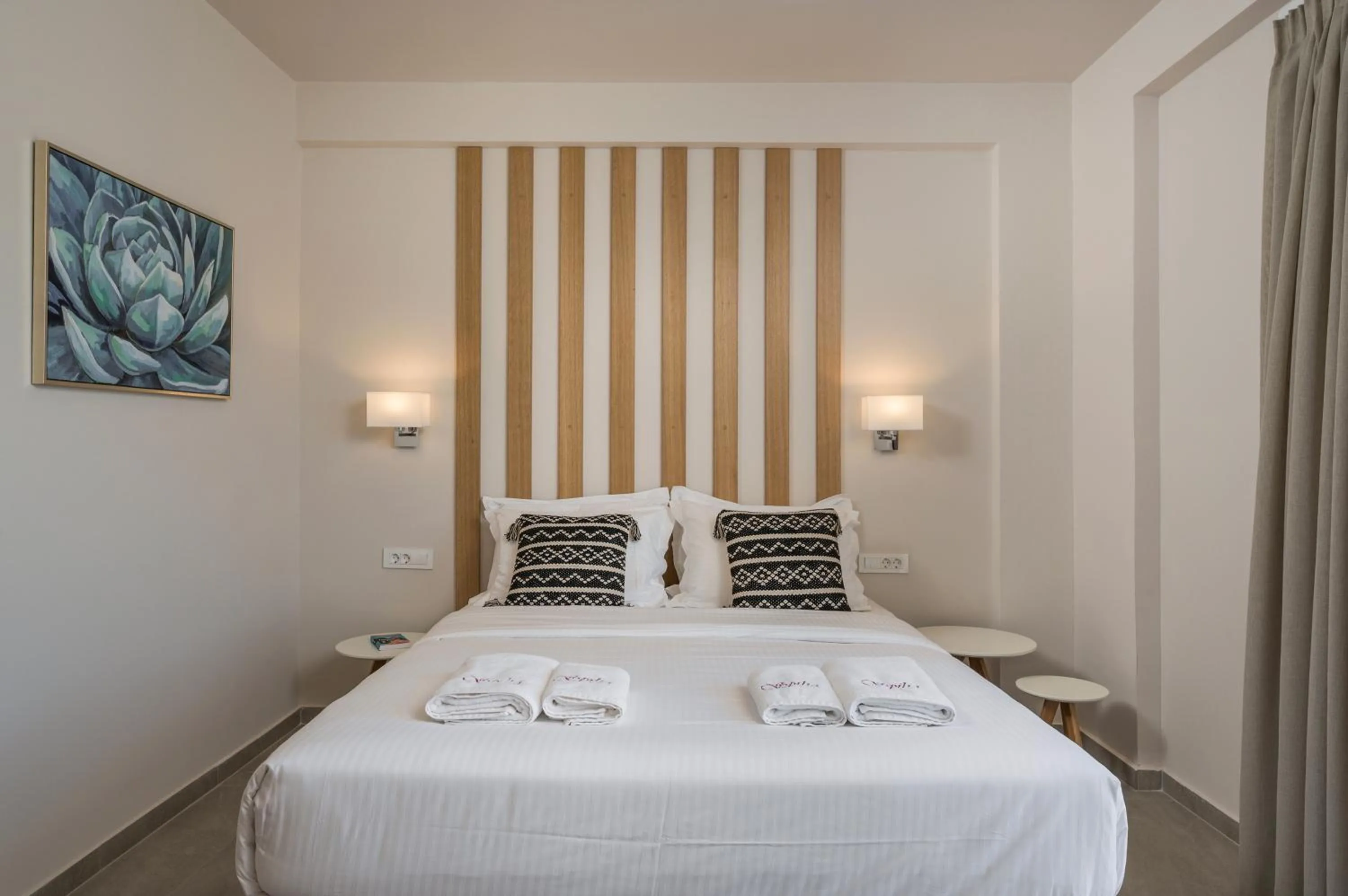 Bed in Spilia Village Hotel & Villas