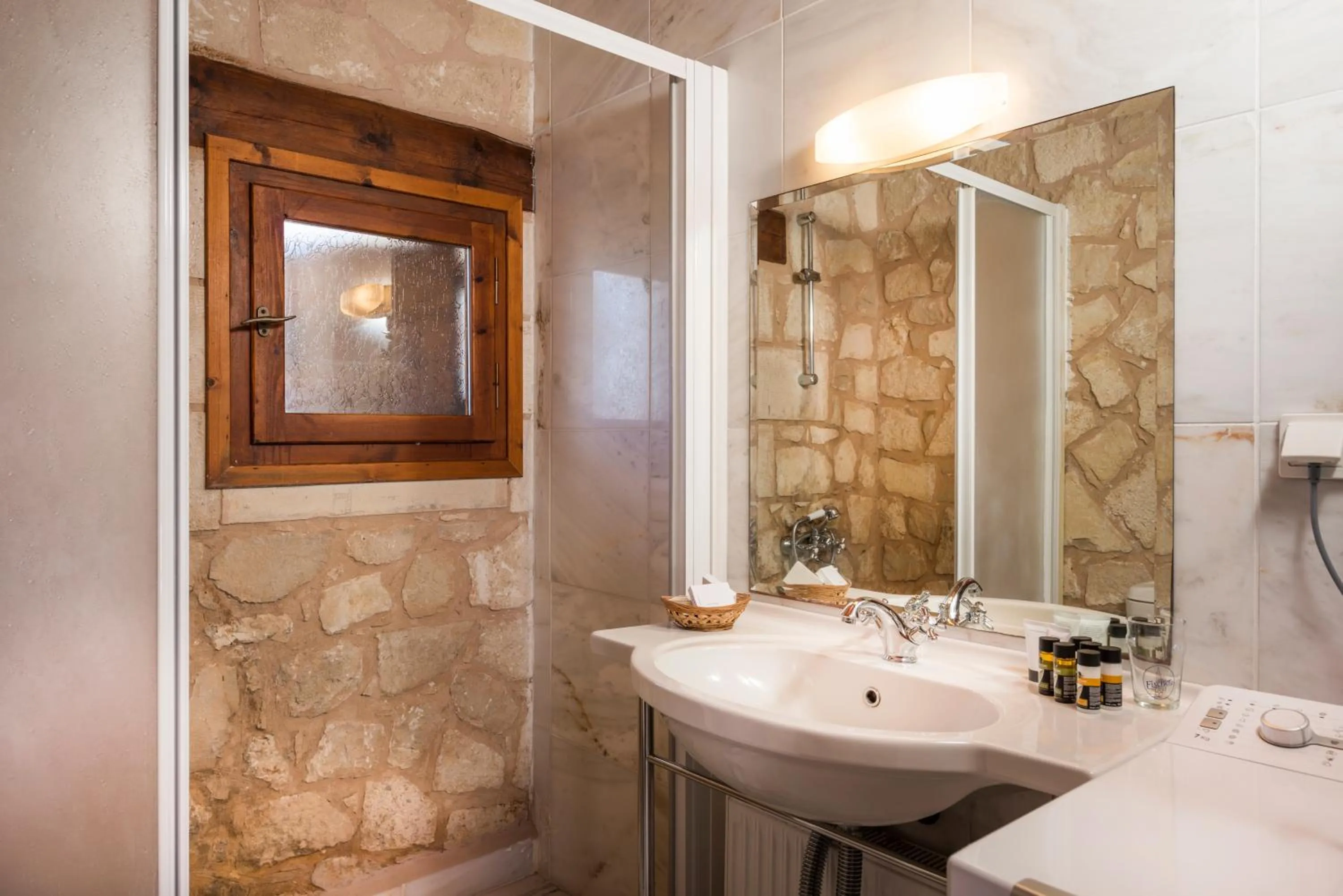 Bathroom in Spilia Village Hotel & Villas