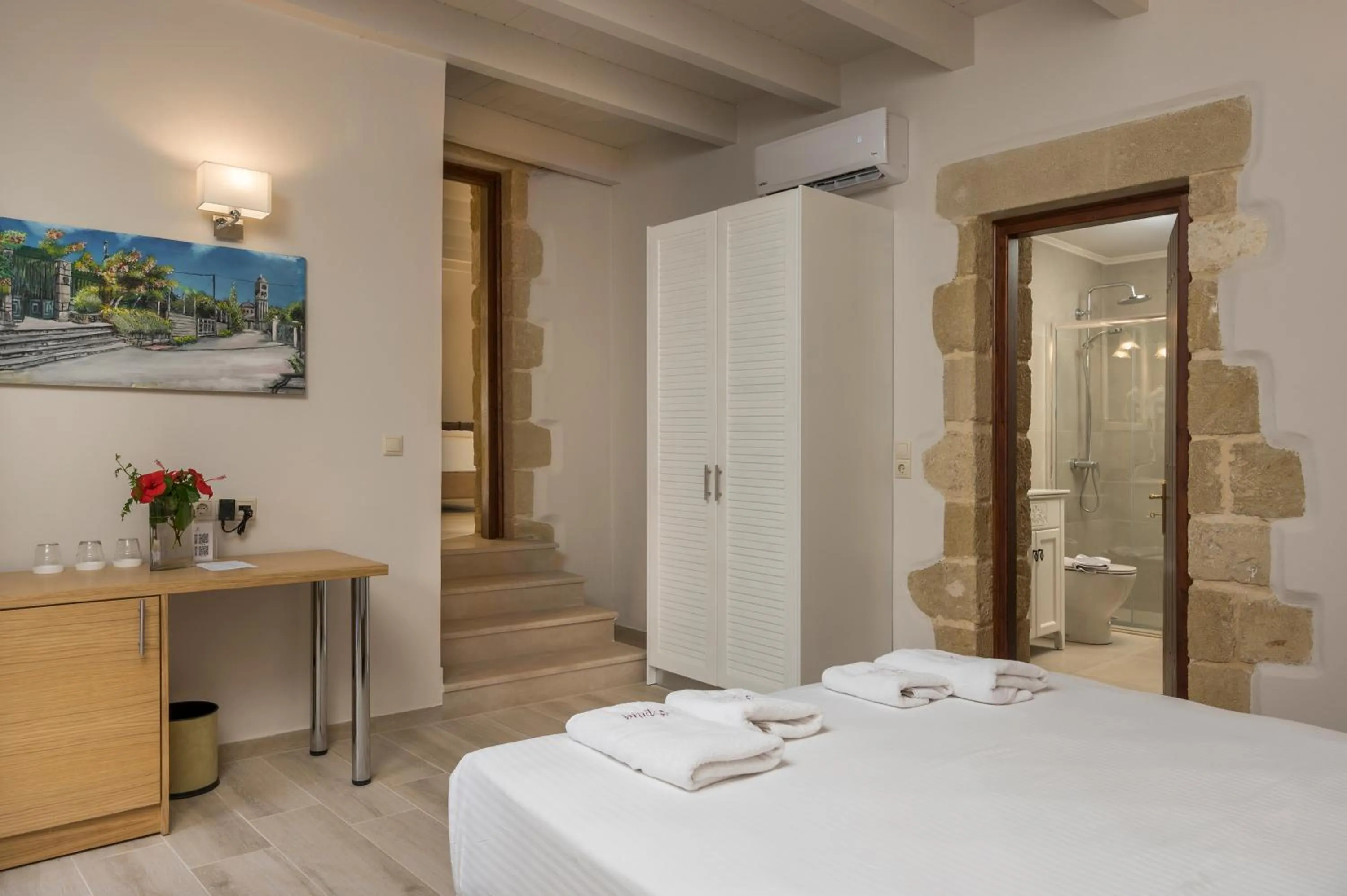 Bed in Spilia Village Hotel & Villas