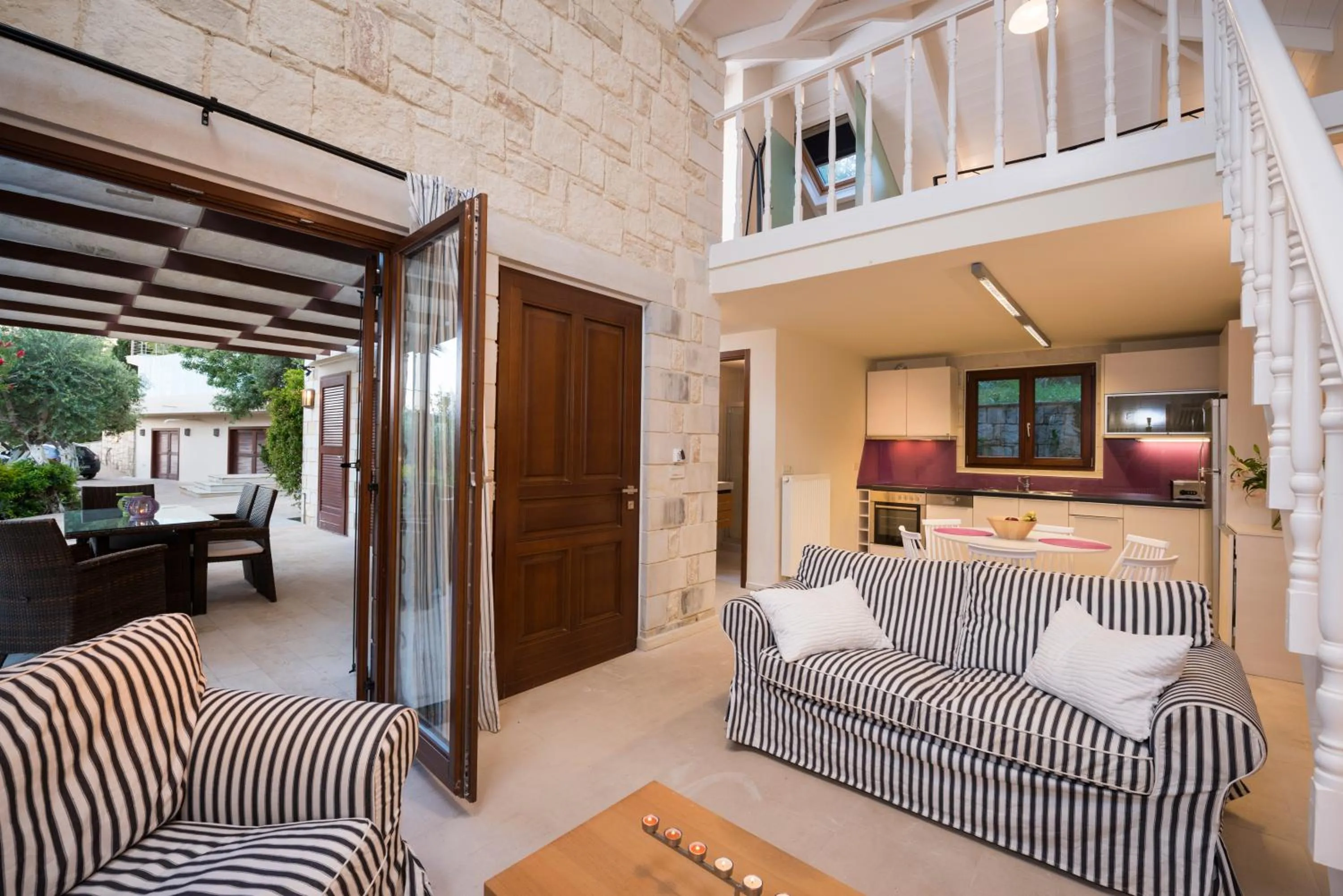 Seating area, Bed in Spilia Village Hotel & Villas