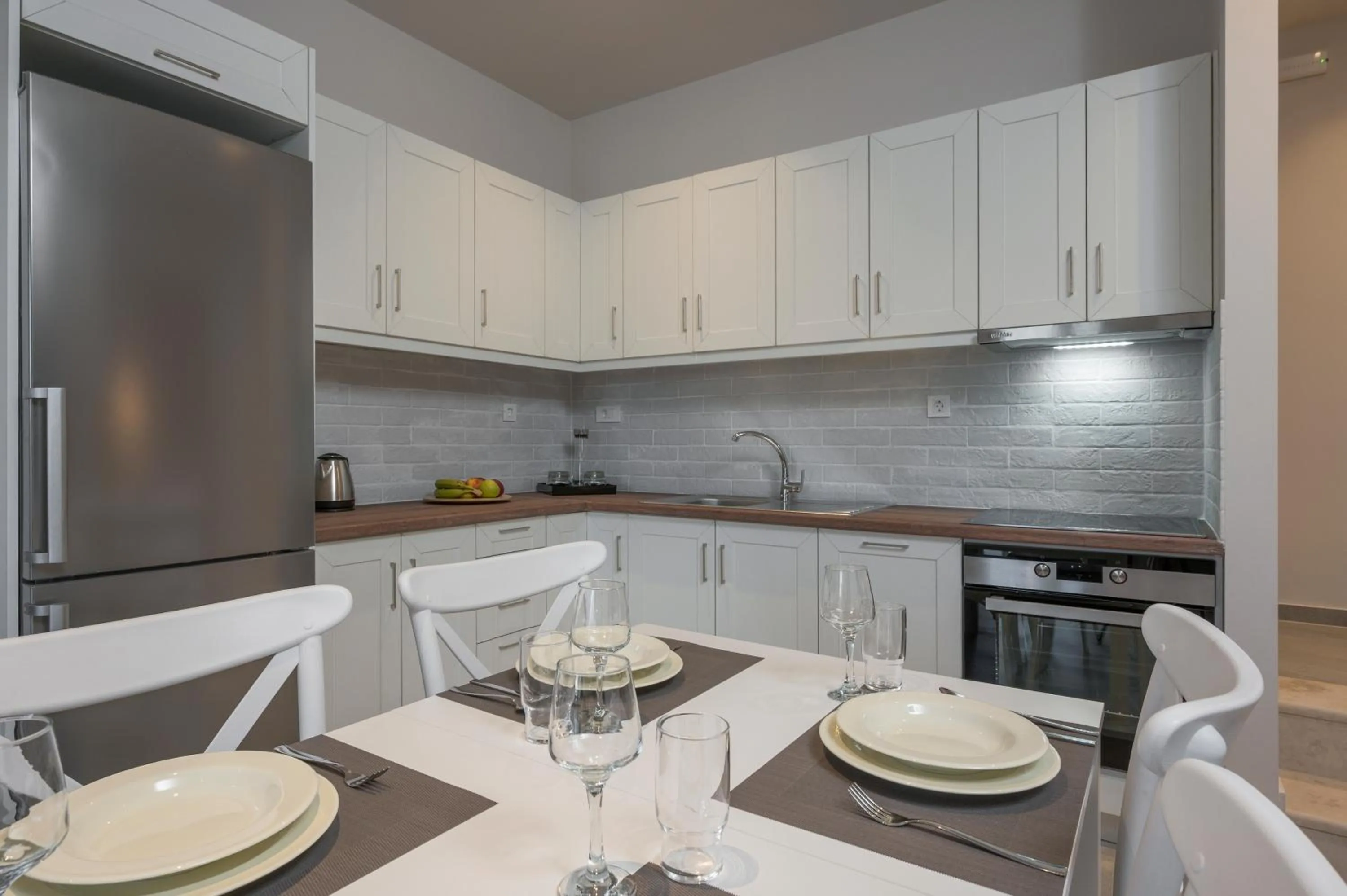 Kitchen or kitchenette in Spilia Village Hotel & Villas