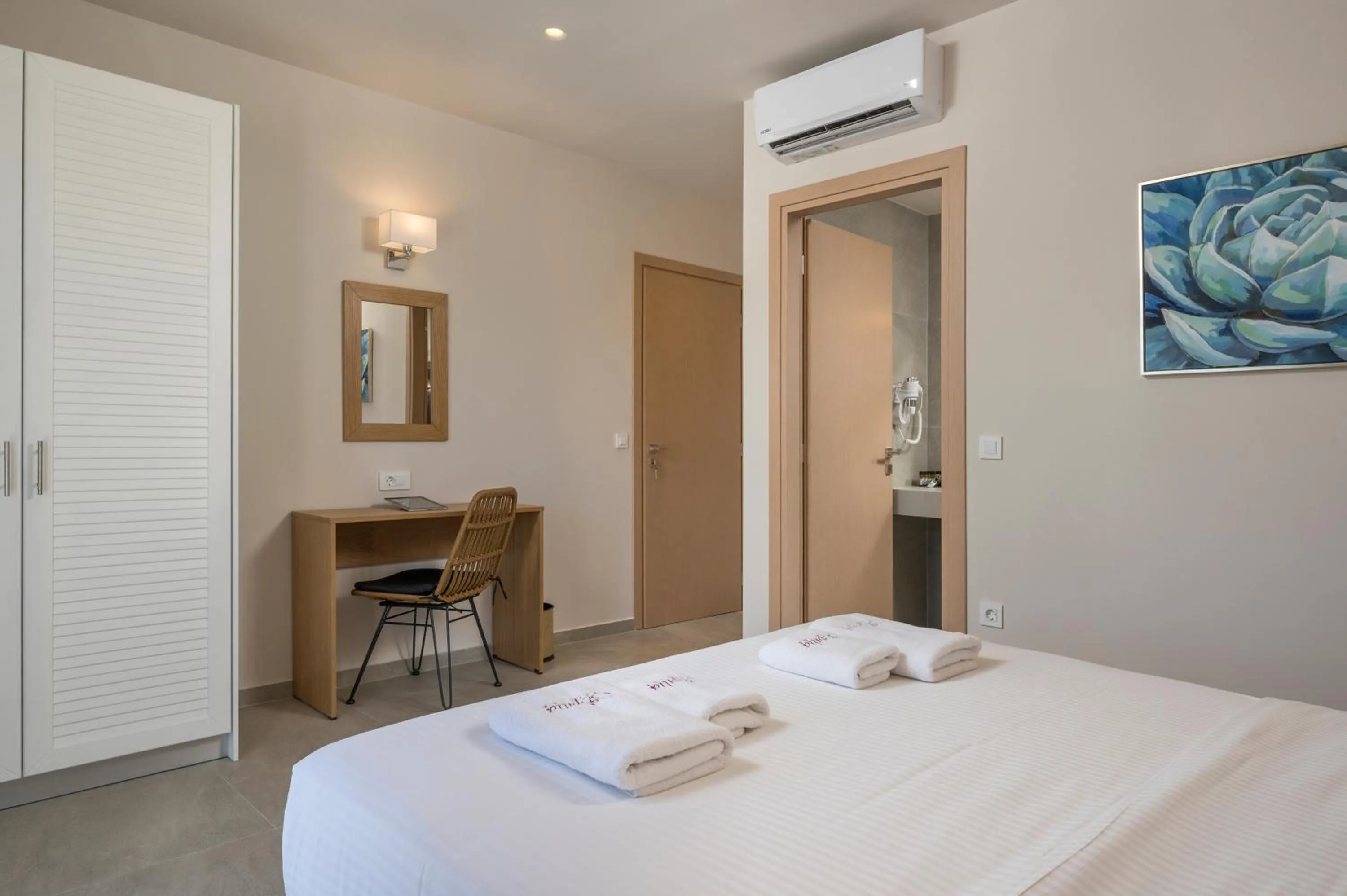Bed in Spilia Village Hotel & Villas
