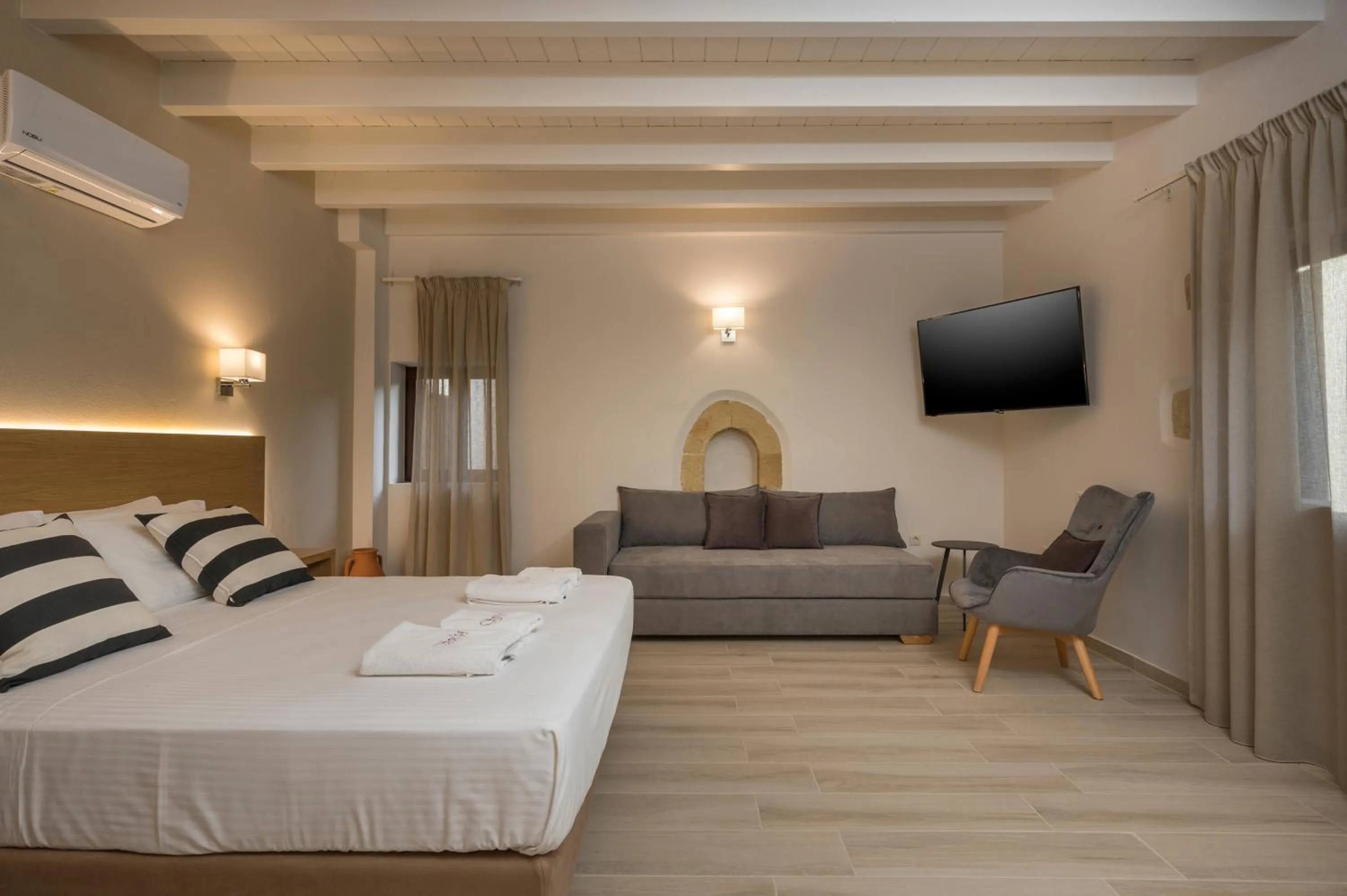 Bed in Spilia Village Hotel & Villas