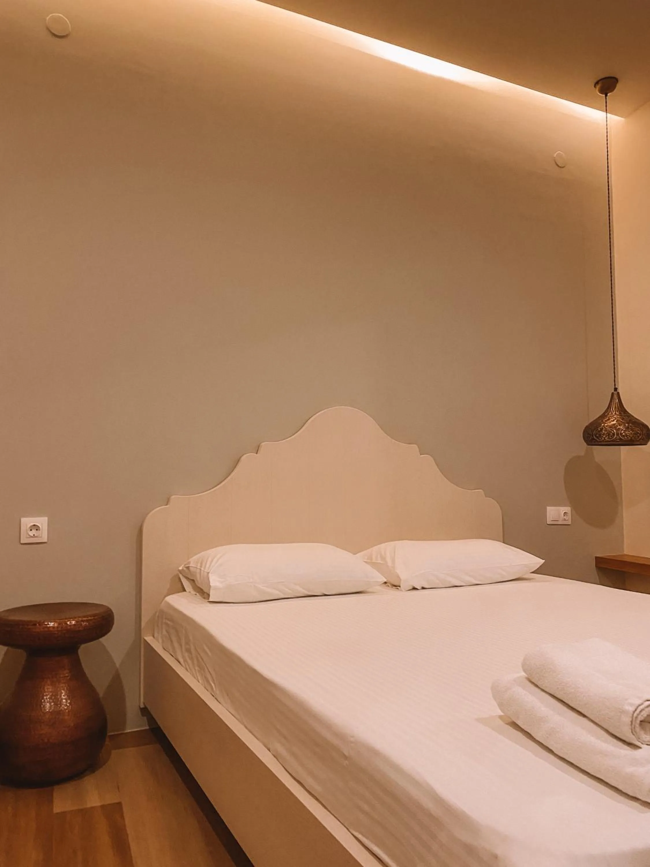 Bed in Veranda Rossa Suites