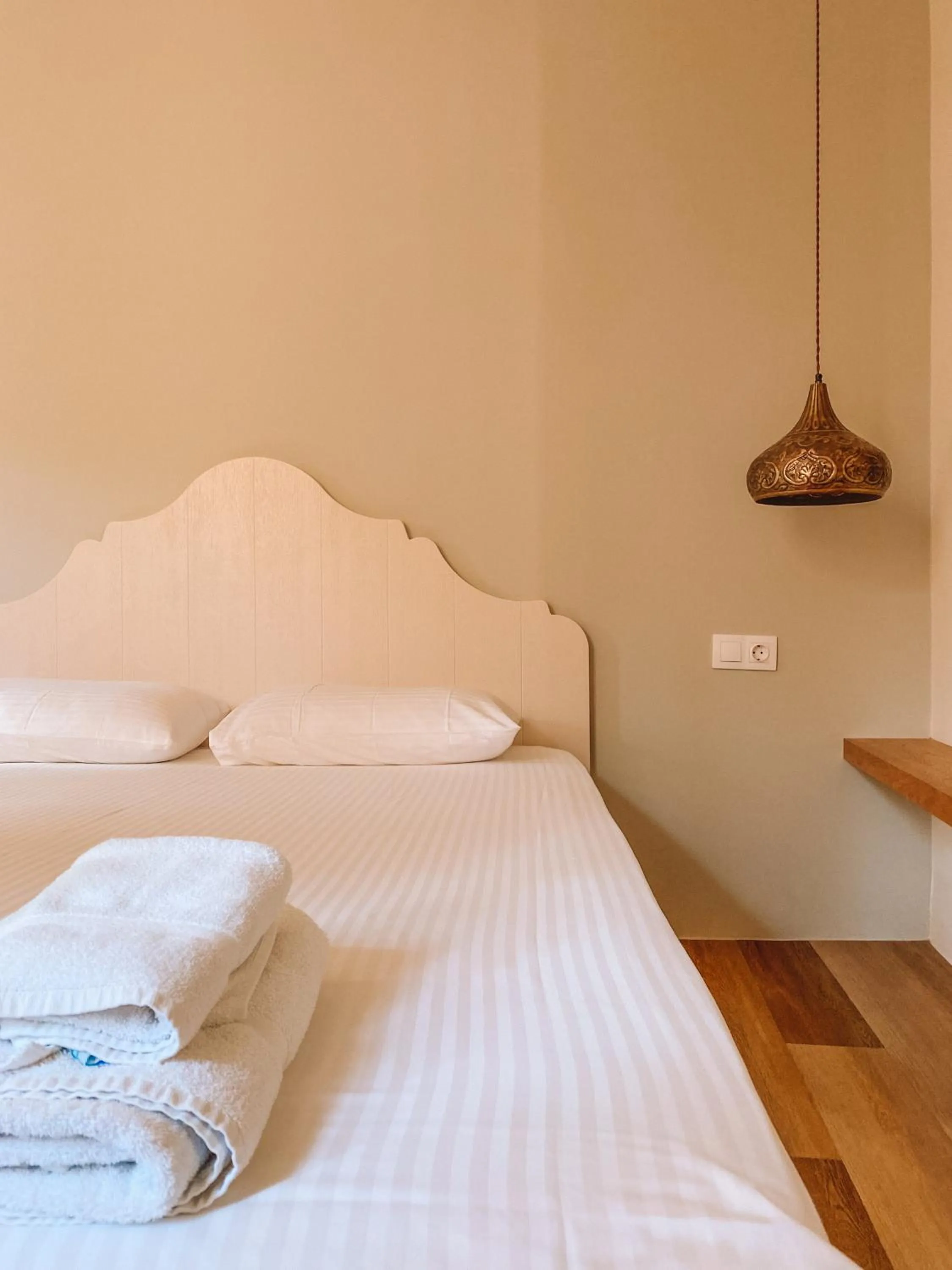 Bed in Veranda Rossa Suites