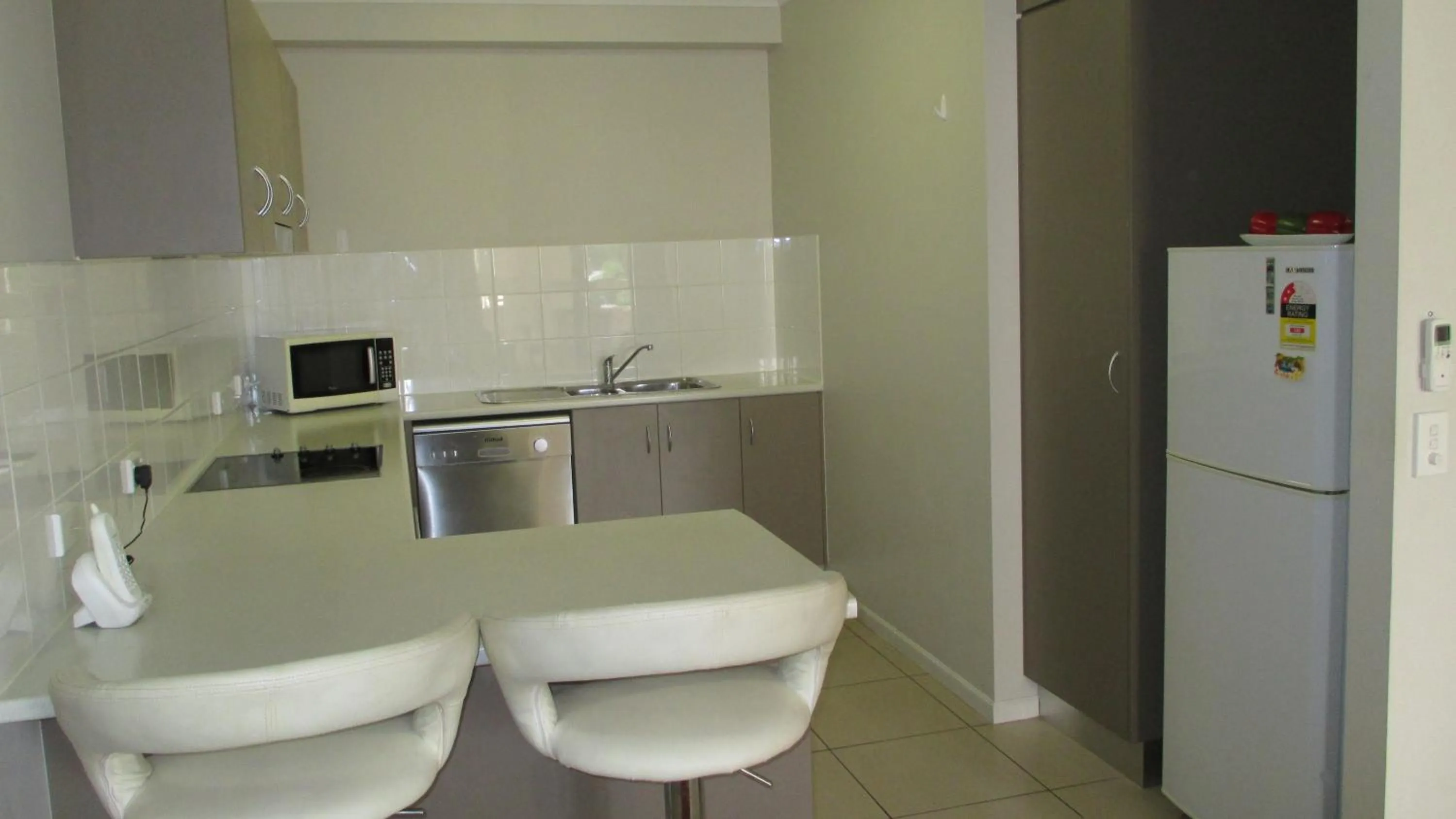 Kitchen or kitchenette in Edge Apartments Cairns