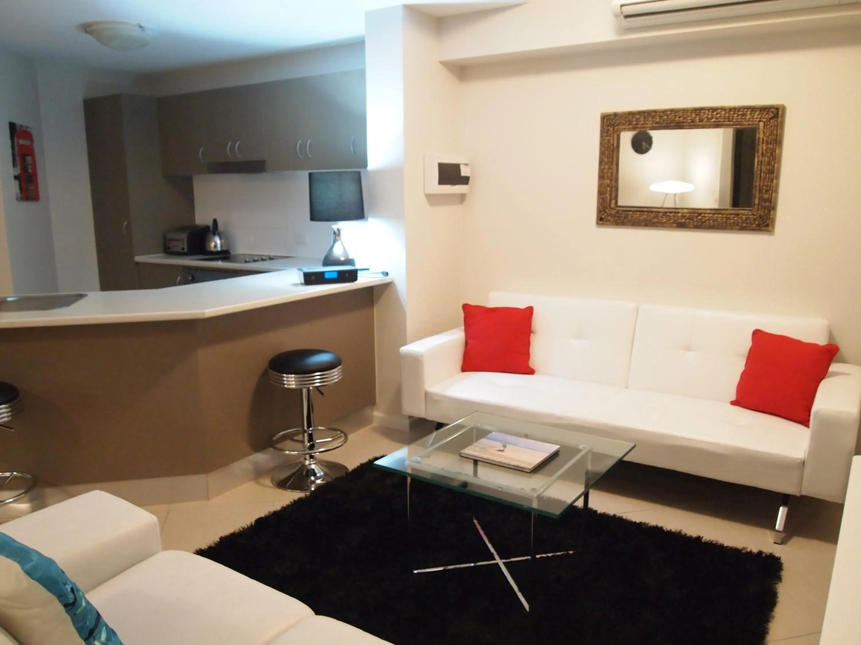Seating area in Edge Apartments Cairns