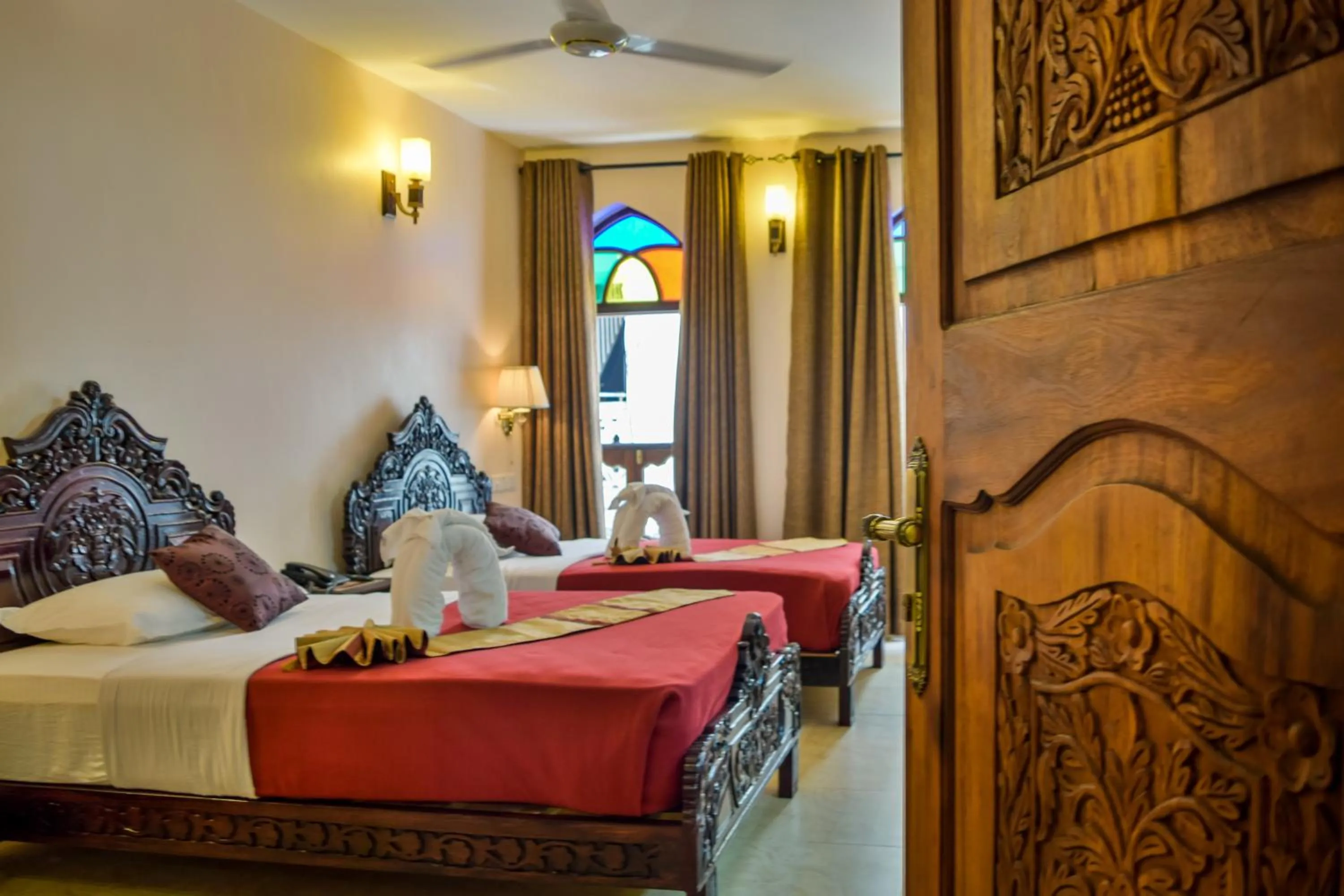 Bed in Tembo Palace Hotel