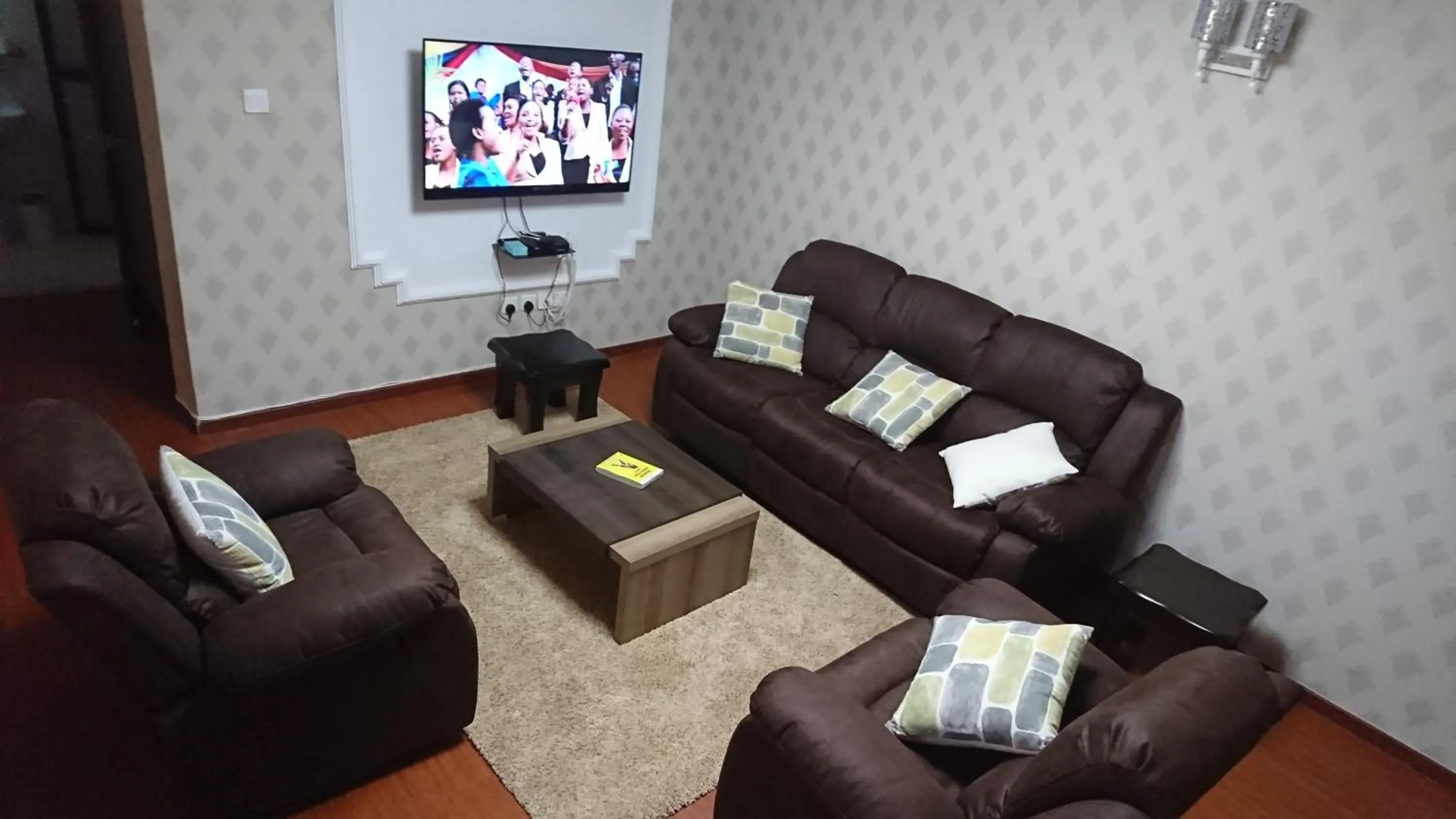 Communal lounge/ TV room in Covitech Apartments