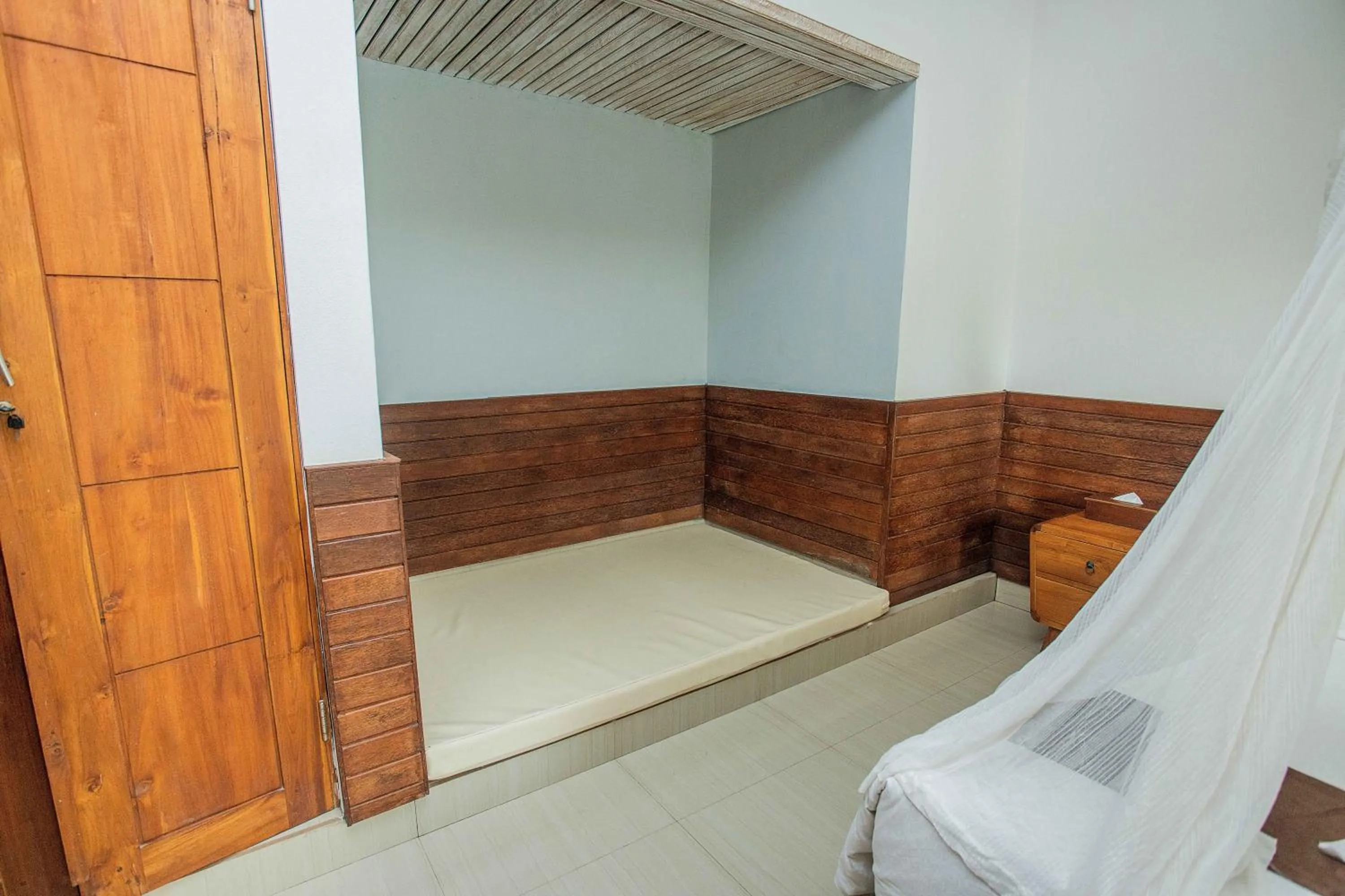 Bed in The Tanis Beach Resort Nusa Lembongan