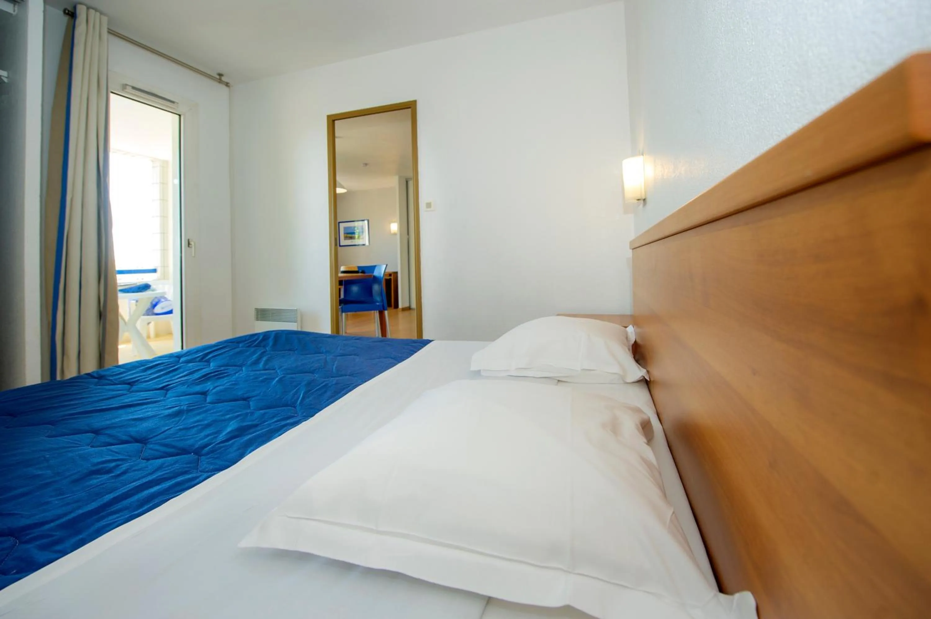 Bedroom, Bed in Appart'hôtel Goélia Sun City