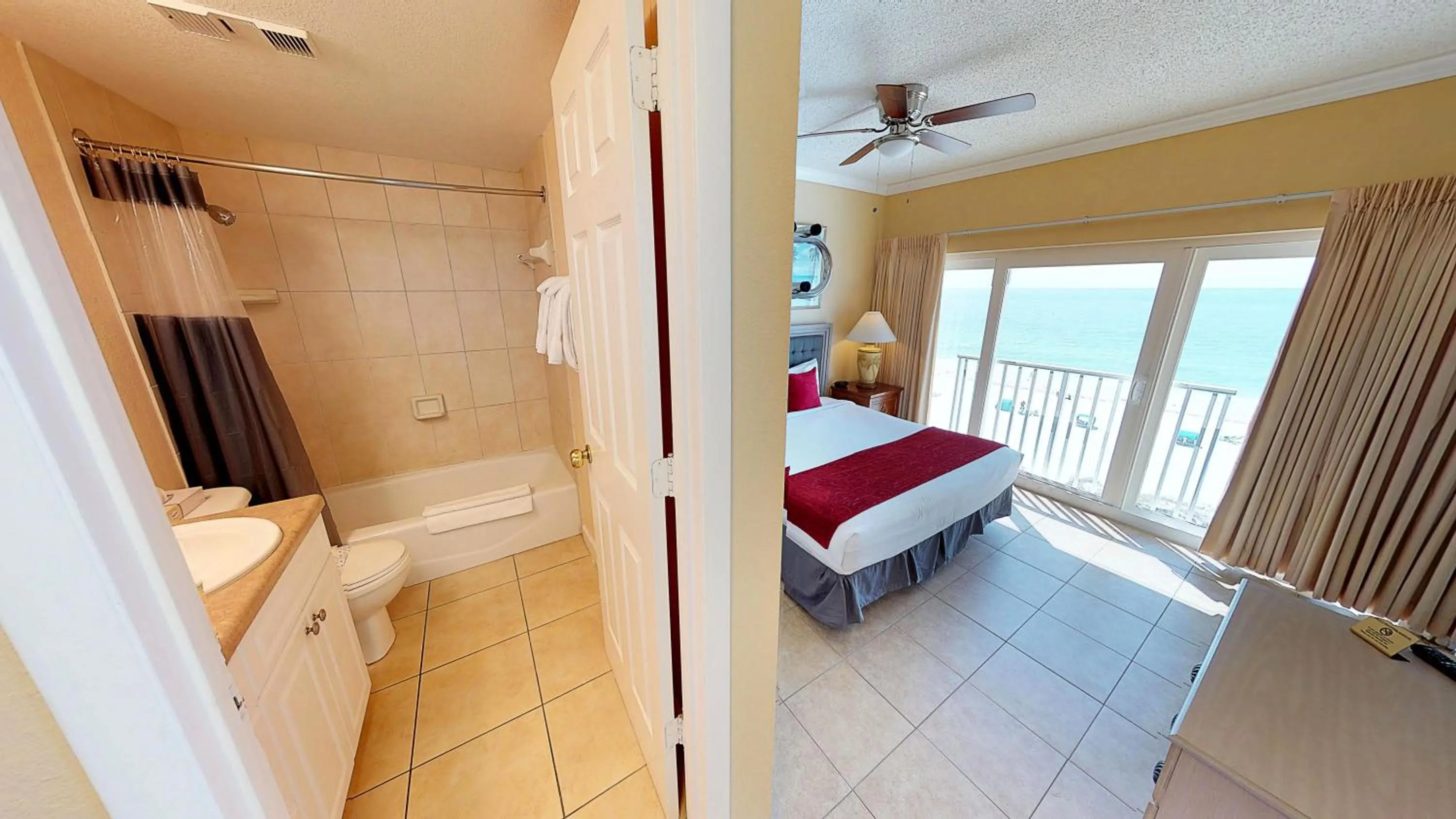 Bathroom, Bed in Island Inn Beach Resort