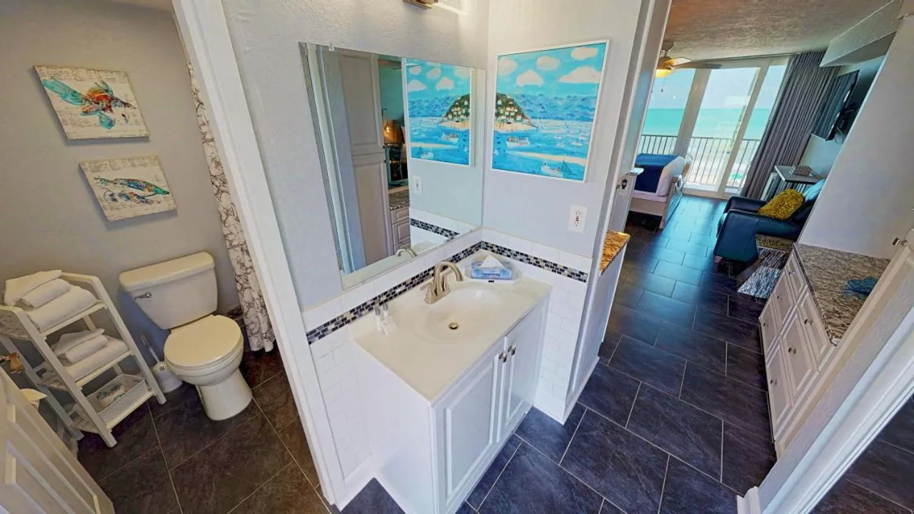 Bathroom, Bed in Island Inn Beach Resort