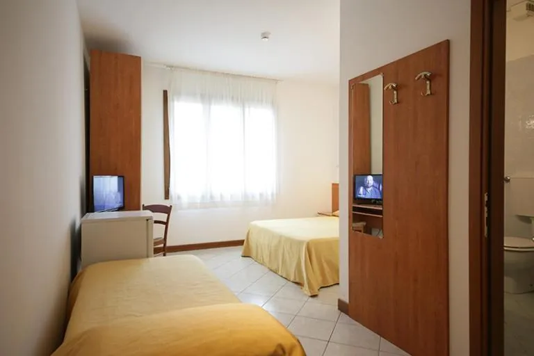 Bed in Hotel New Aurora Venice